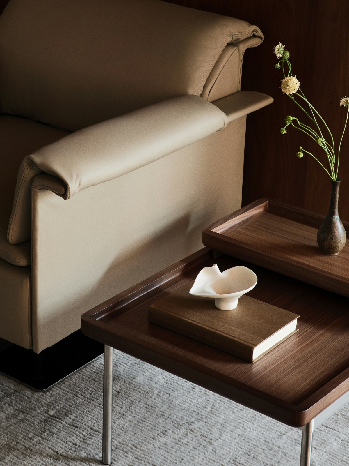 Tuxedo Component Side Table designed by BassamFellows for Geiger in natural walnut shown next to a Mantle Club Chair.