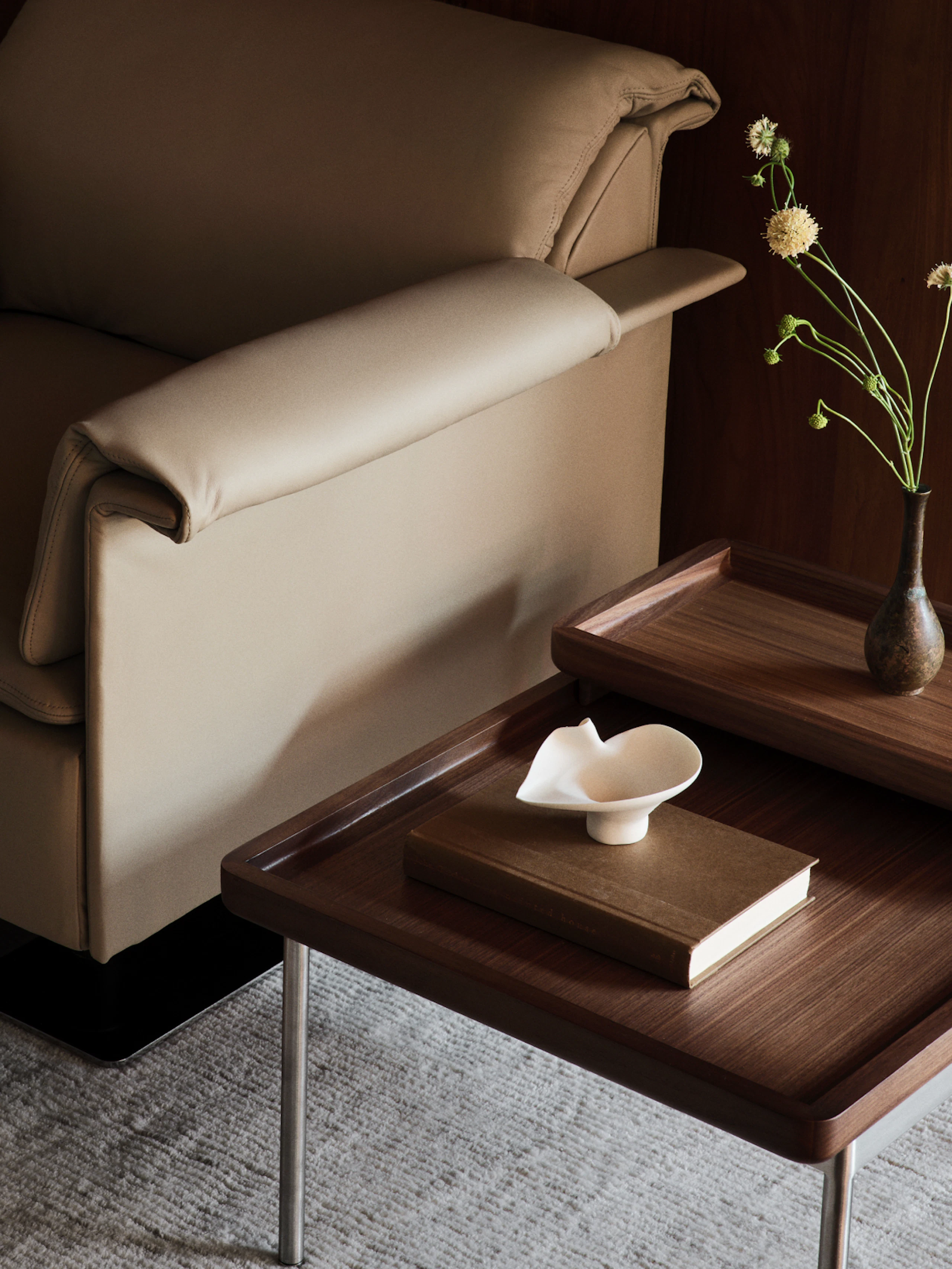 Tuxedo Component Side Table designed by BassamFellows for Geiger in natural walnut shown next to a Mantle Club Chair.