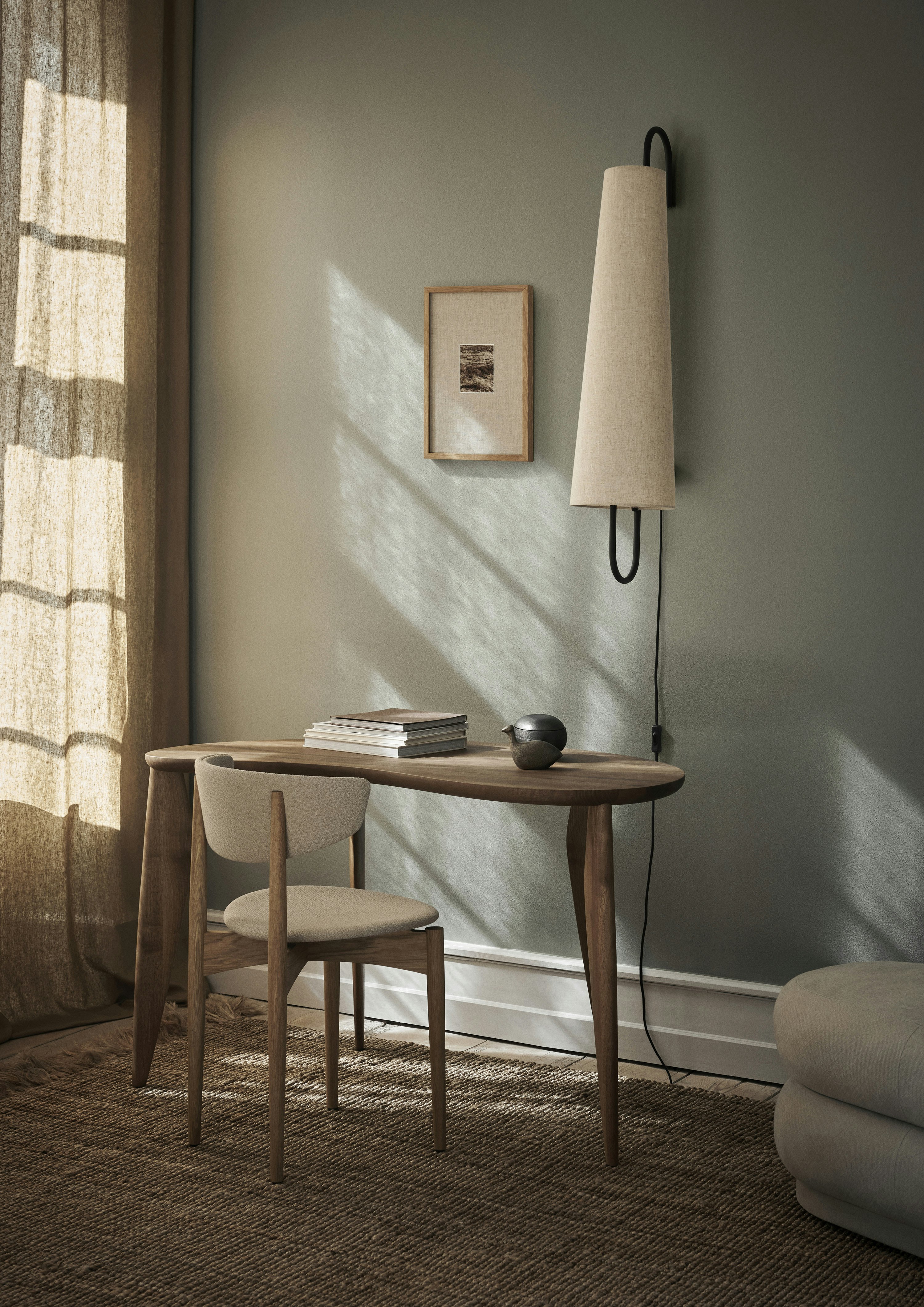 An environmental shot of a Feve Desk in Walnut.