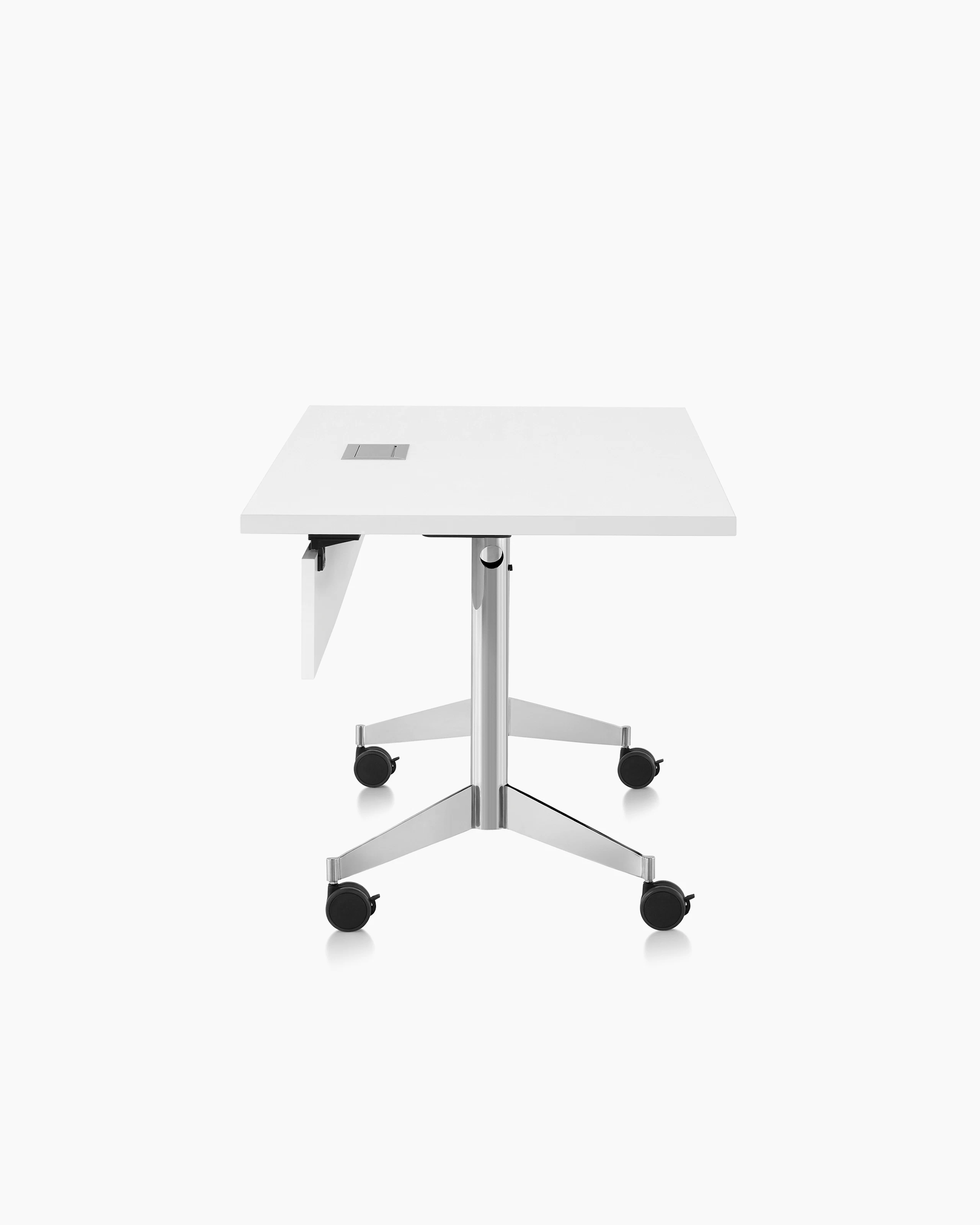 An MP Flex table in studio white laminate, viewed from the side.