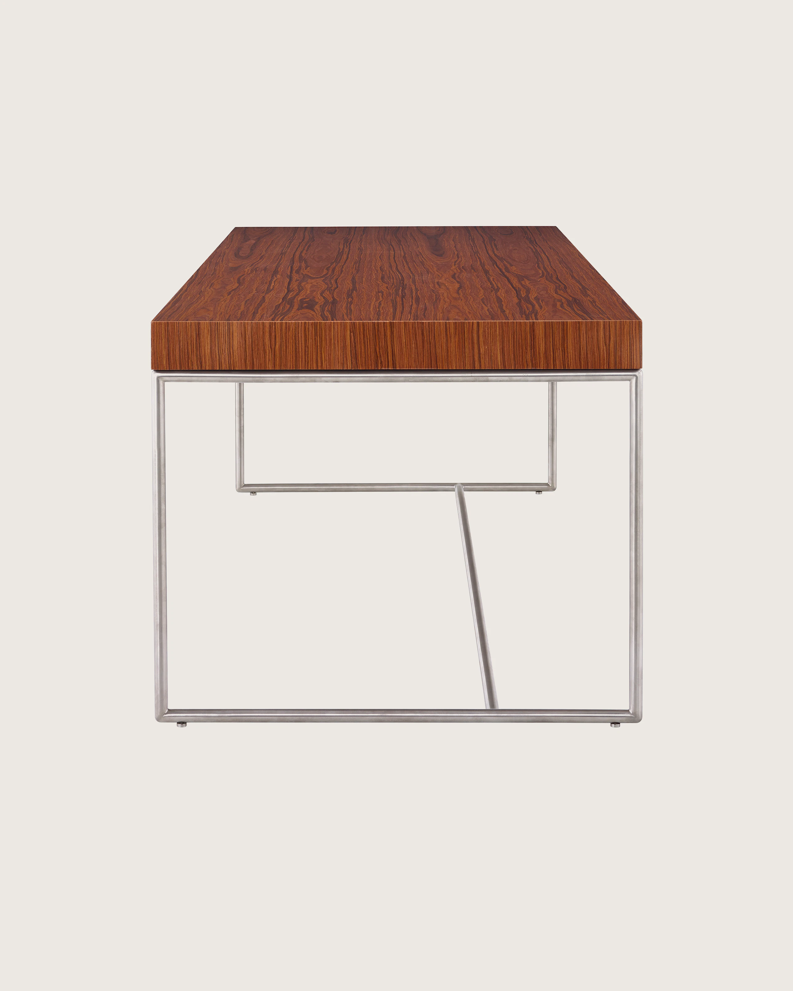 A Domino Desk with wood top and metal base.