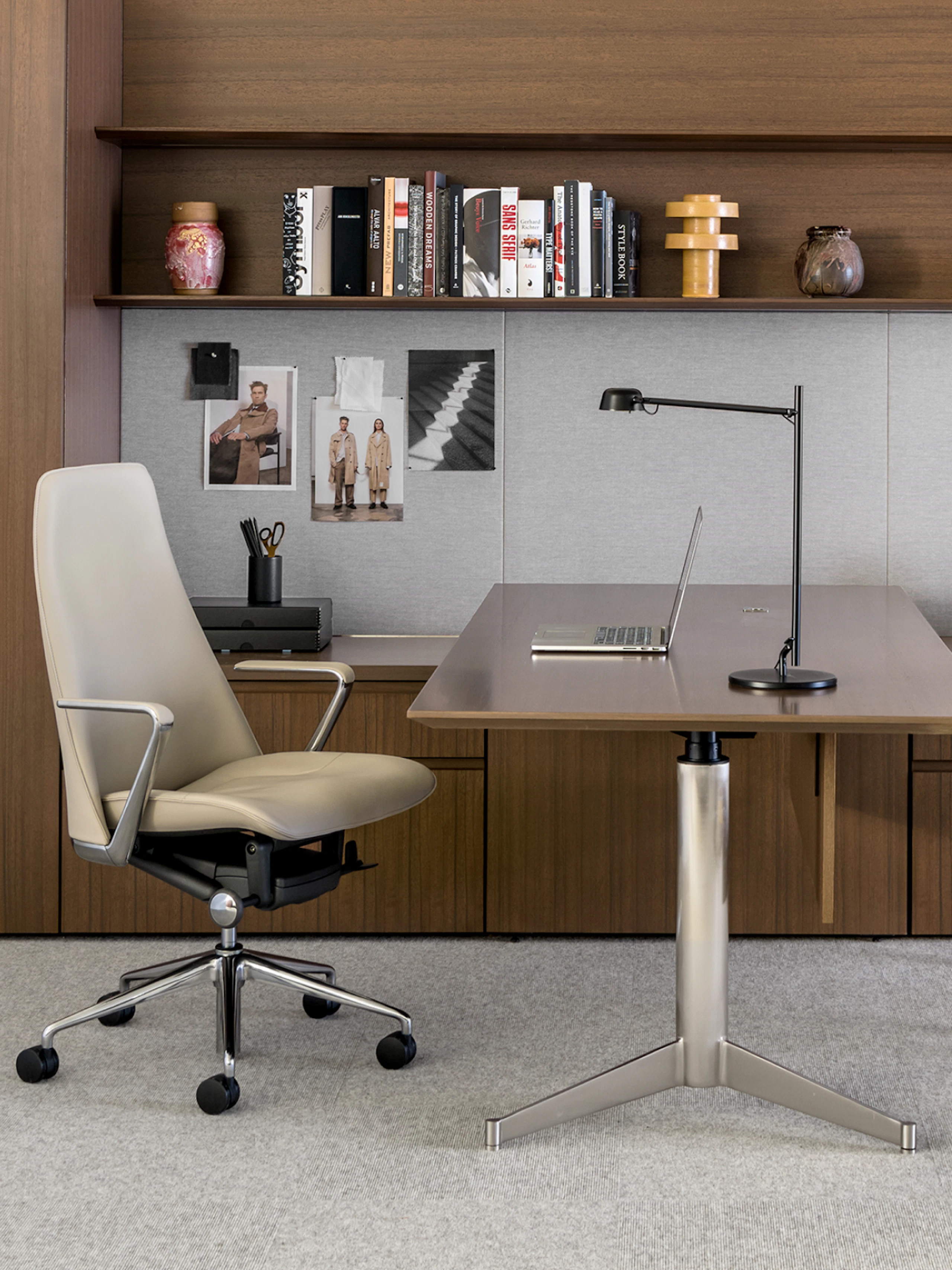 A private office featuring an MP Height-Adjustable Table and a beige leather Taper executive chair.