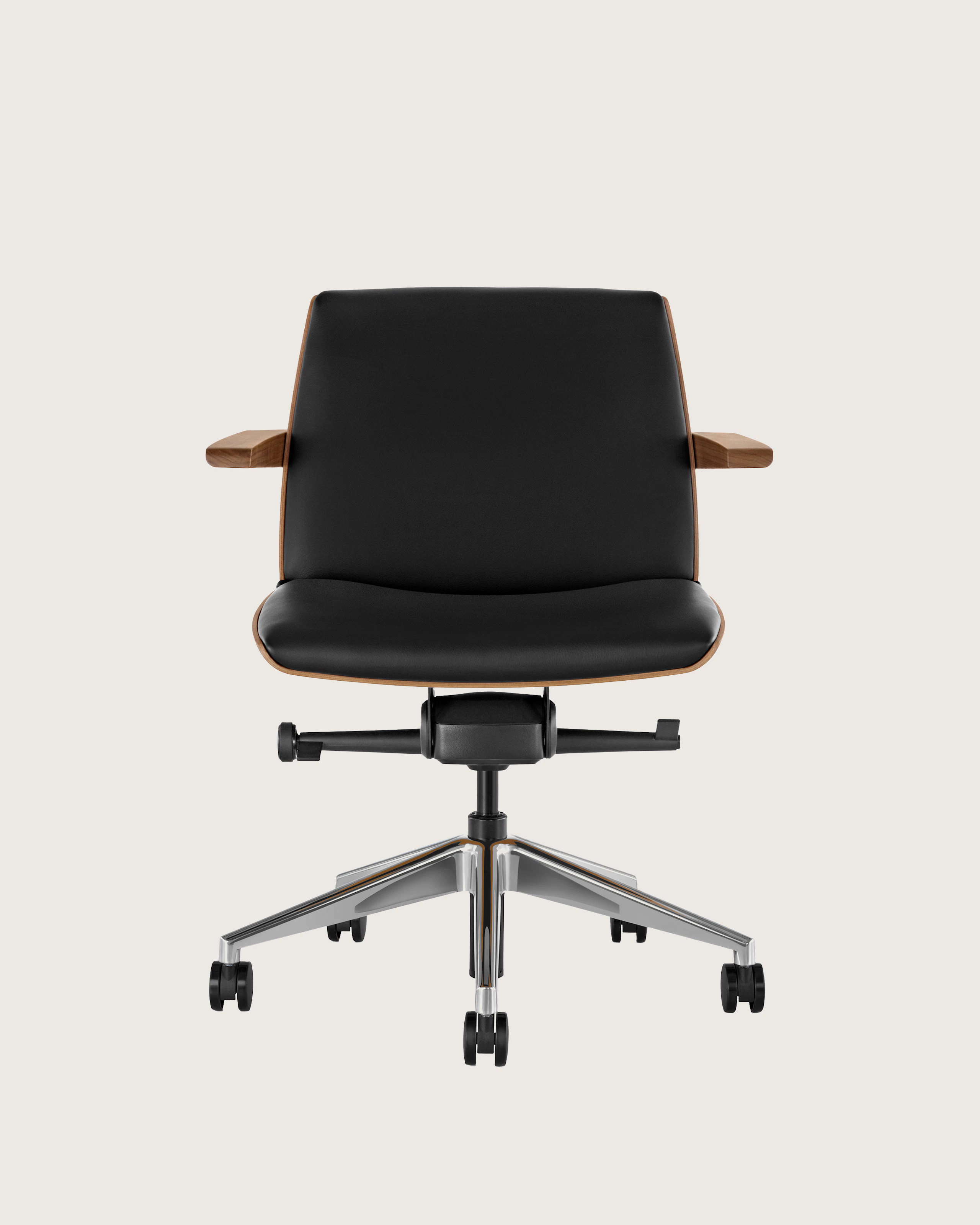 Front view of a low-back Clamshell Conference chair with black leather upholstery, a walnut shell, with arms.
