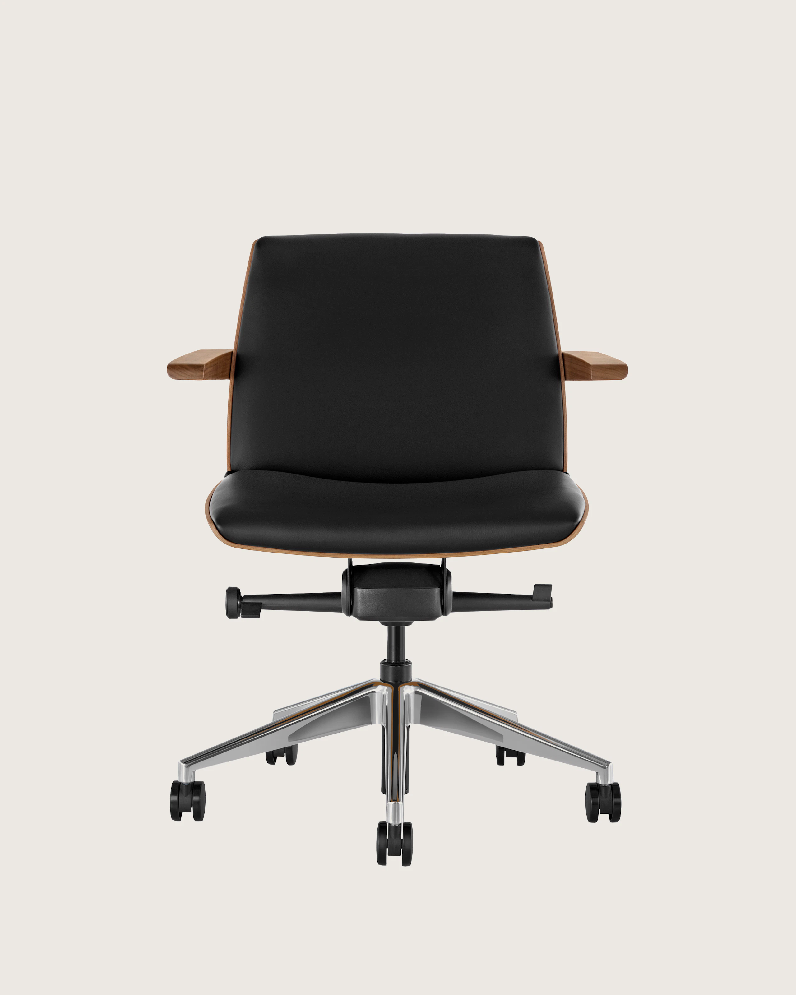 Front view of a low-back Clamshell office chair with black leather upholstery, a walnut shell, with arms.