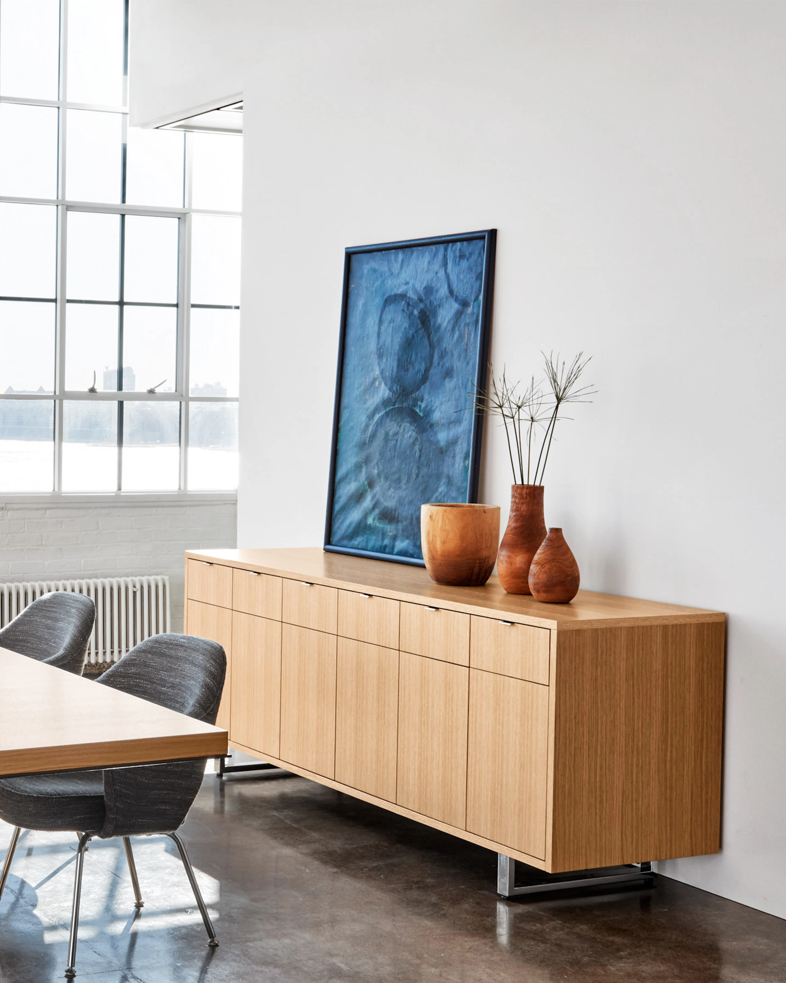 Highline 50 Conference Table in a Conference Room setting with Highline 25 Credenza, angled view.