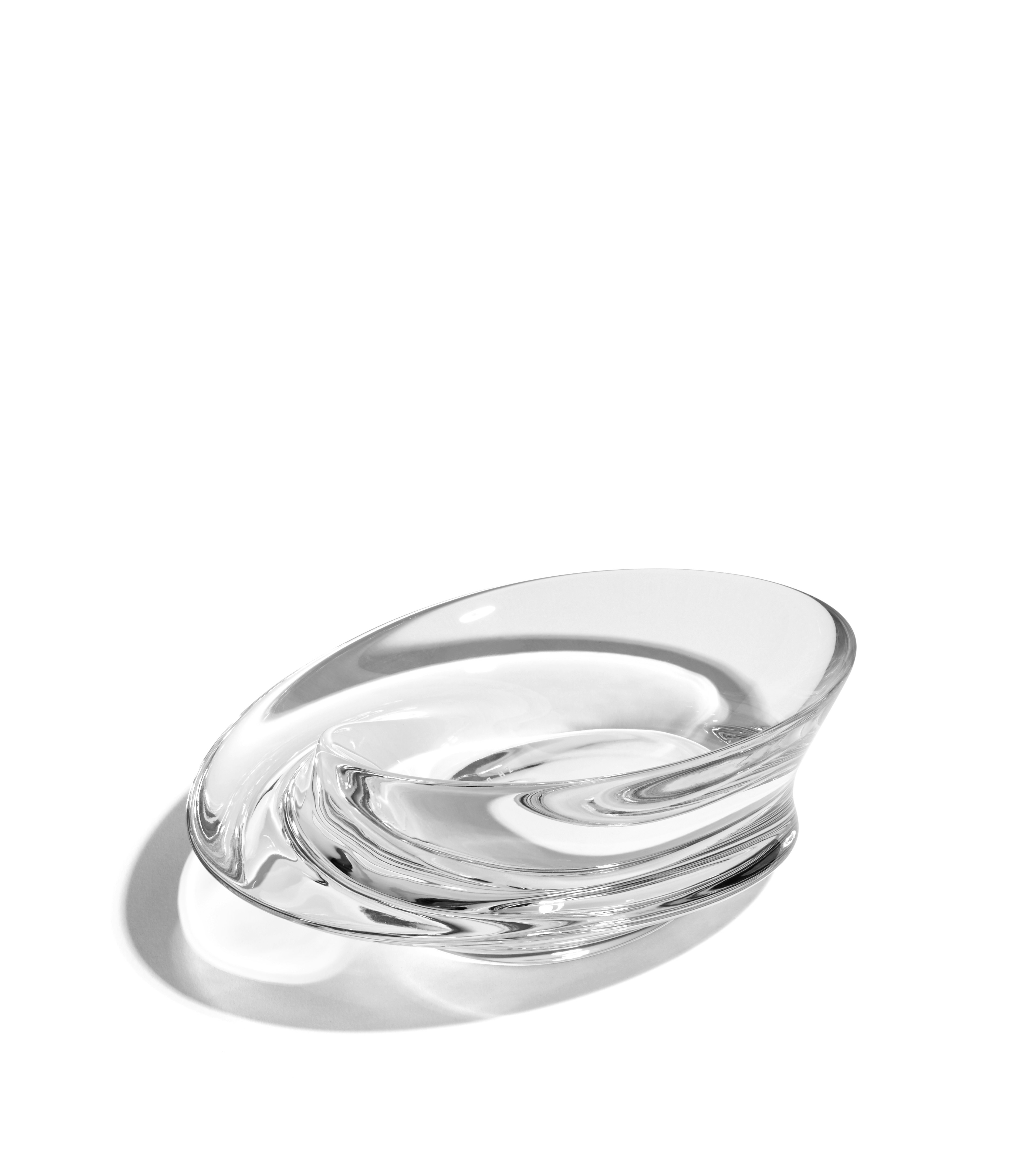 A Swirl Bowl in Small, Glass viewed from an angle.