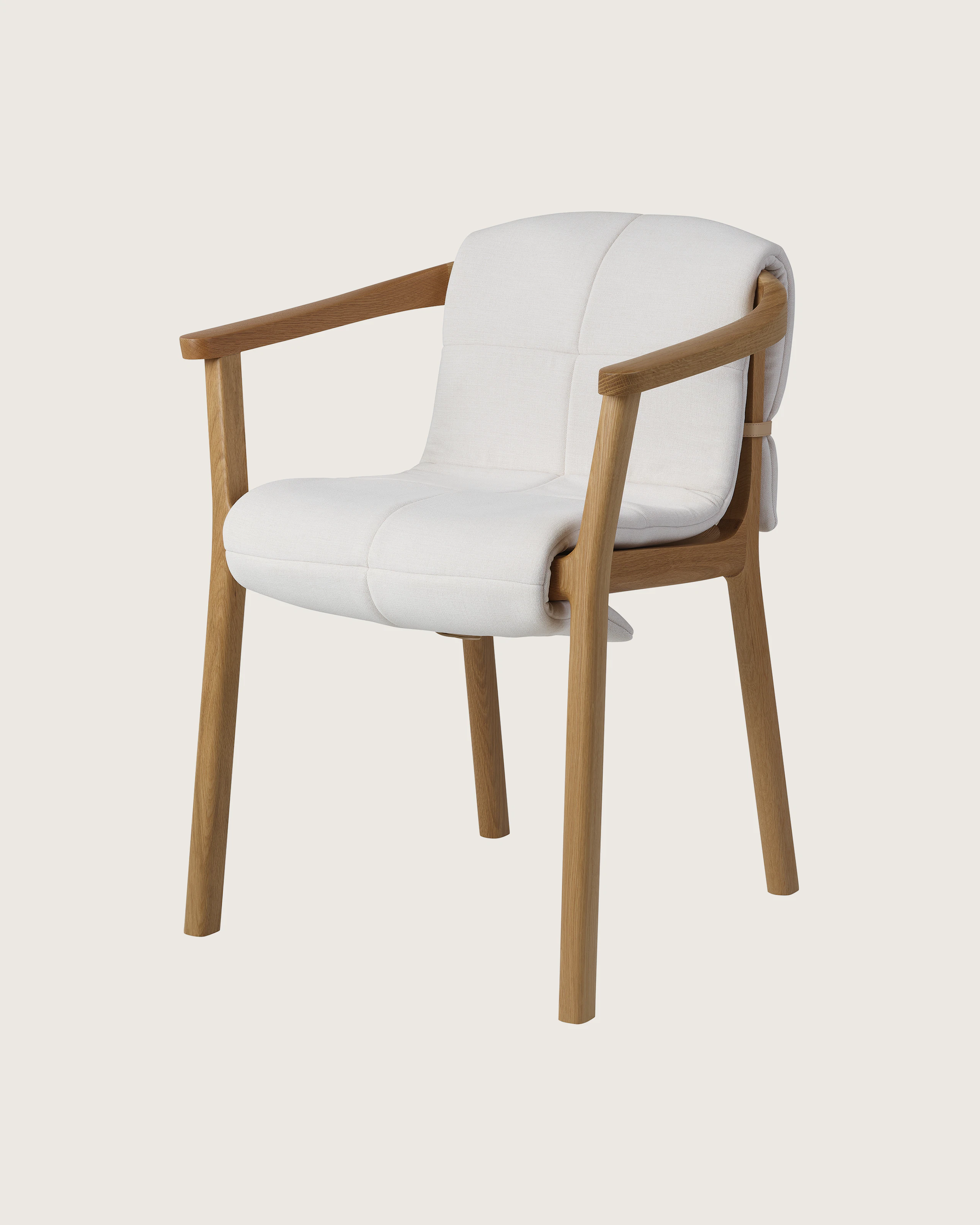Lijn Armchair by Carole Baijings for Geiger in Natural Oak frame with quilted wrap in Vionette White Sand Mix, angled front view on a white sweep.