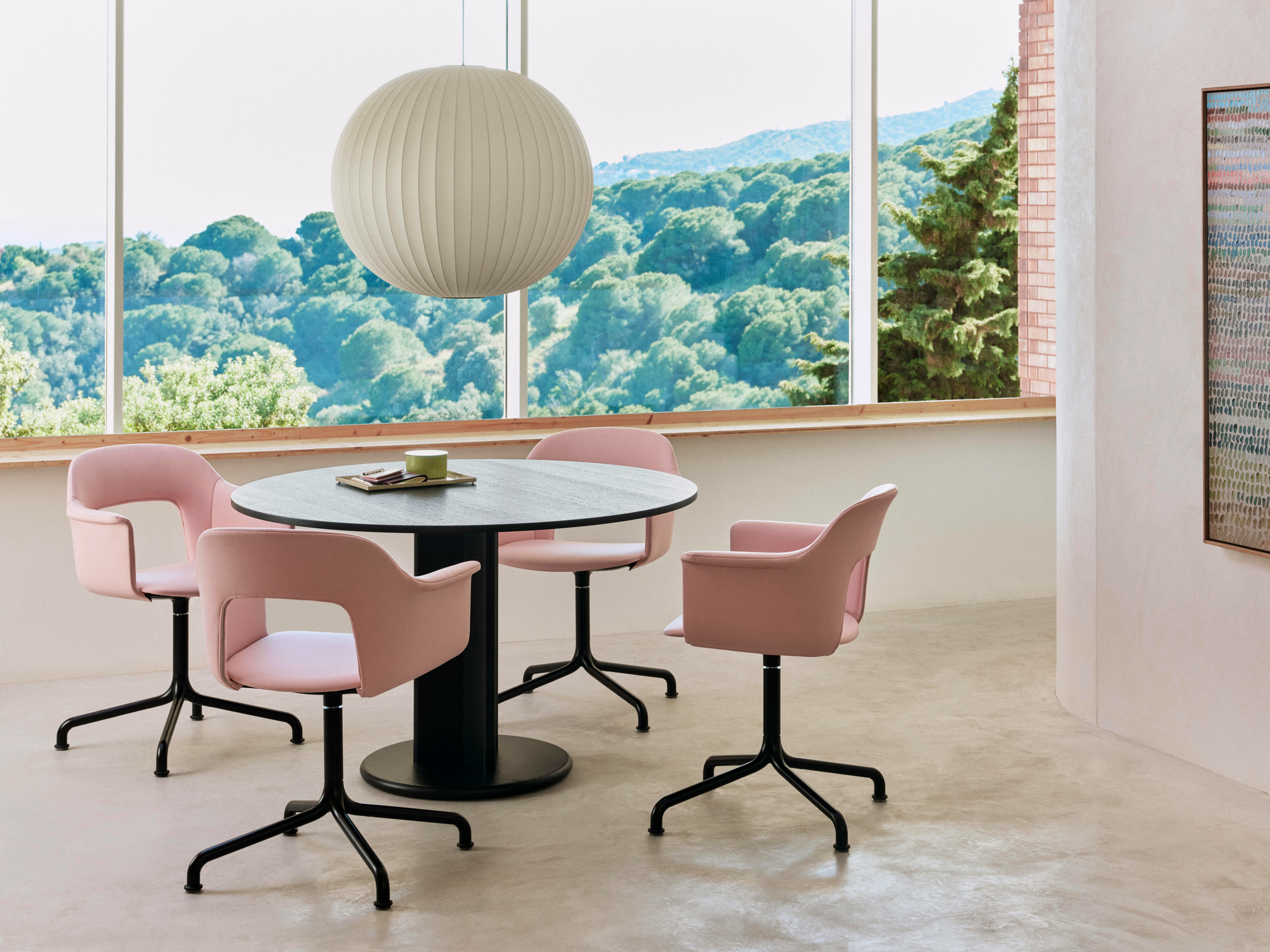 Four Layout armchairs on arc base around Chisel column base table