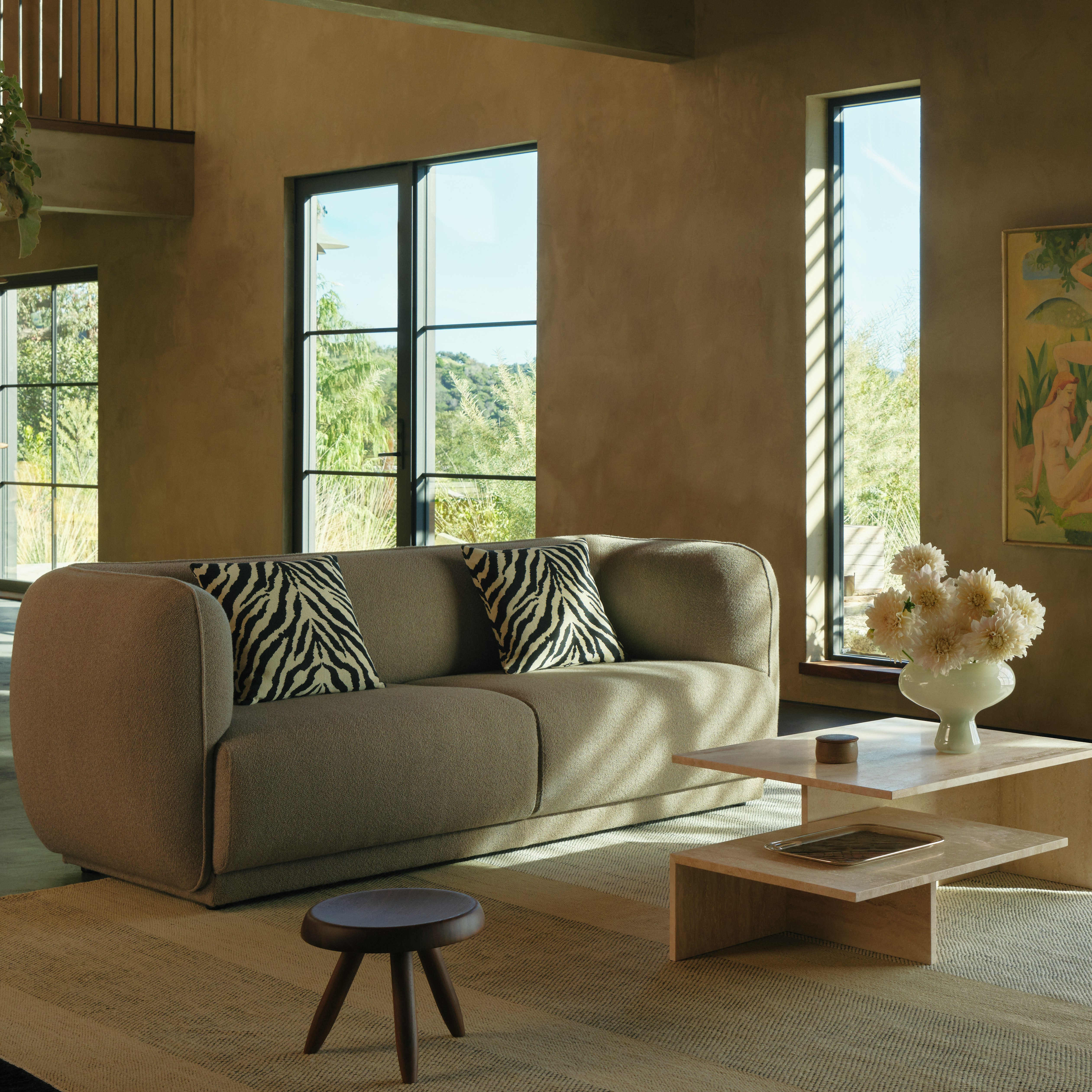 Meris Sofa in Ash Brown turf fabric with Zebra Pillow