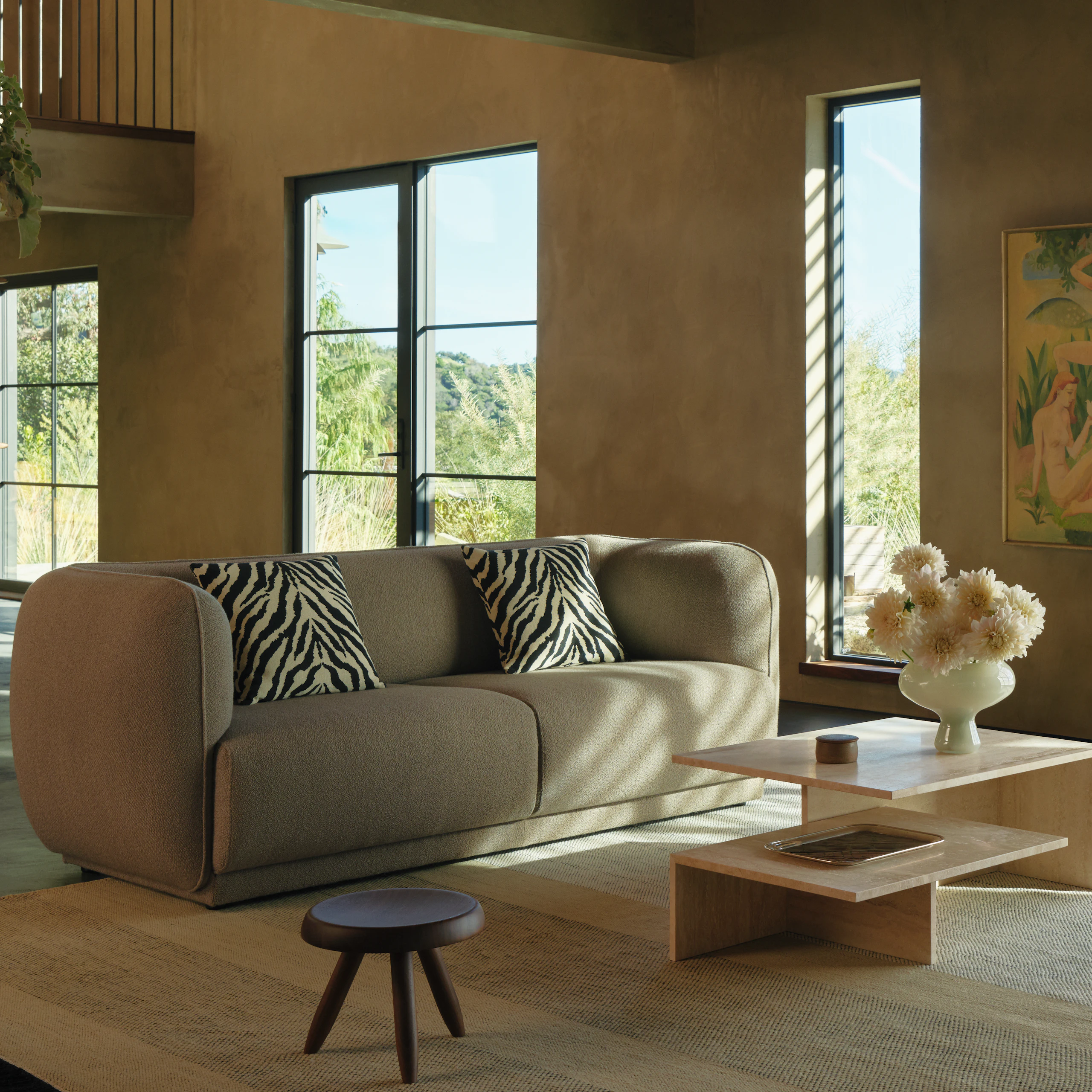 Meris Sofa in Ash Brown turf fabric with Zebra Pillow