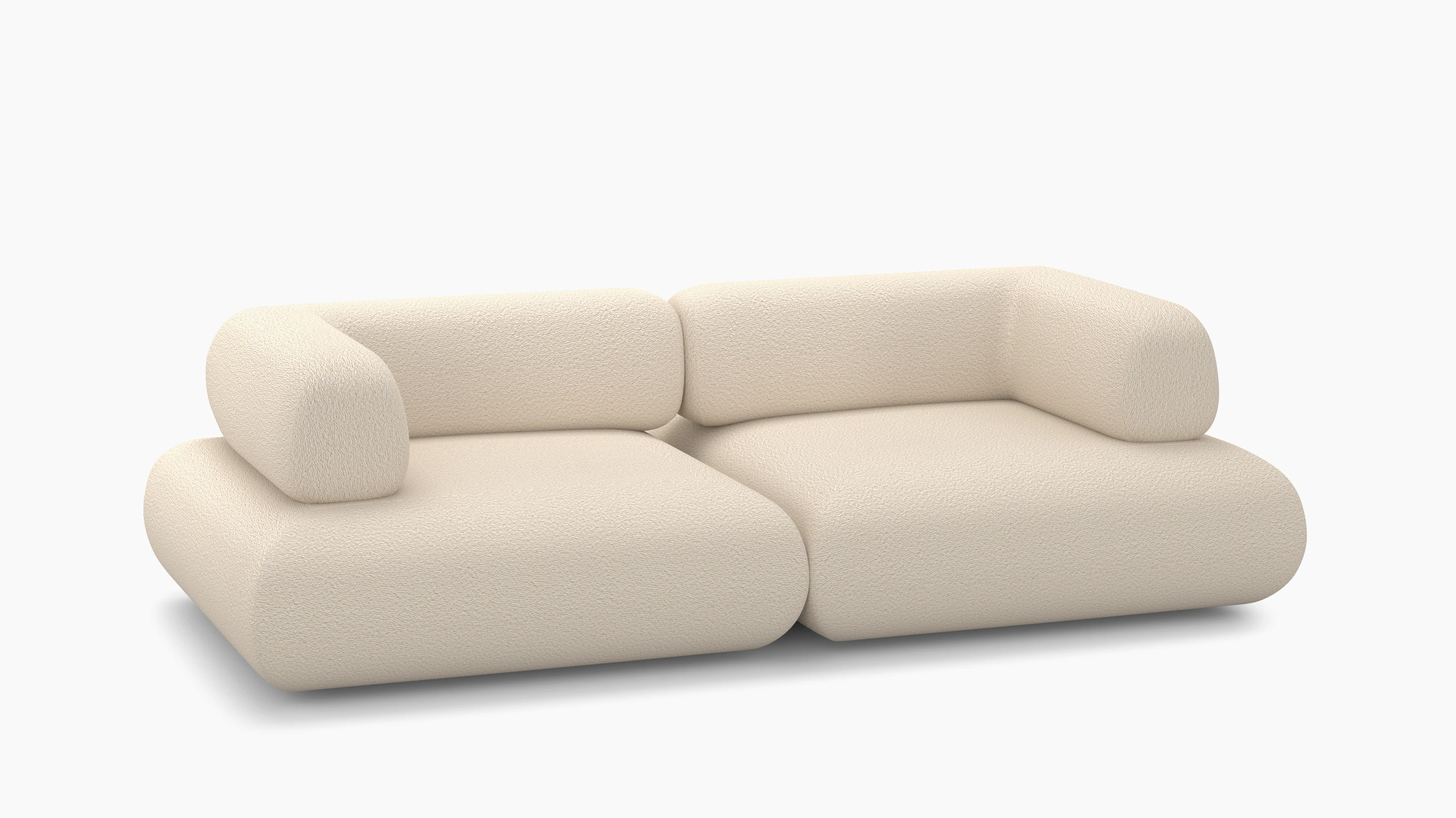 A Sval Sofa in 2 Seater, Turf, Cream viewed from an angle.