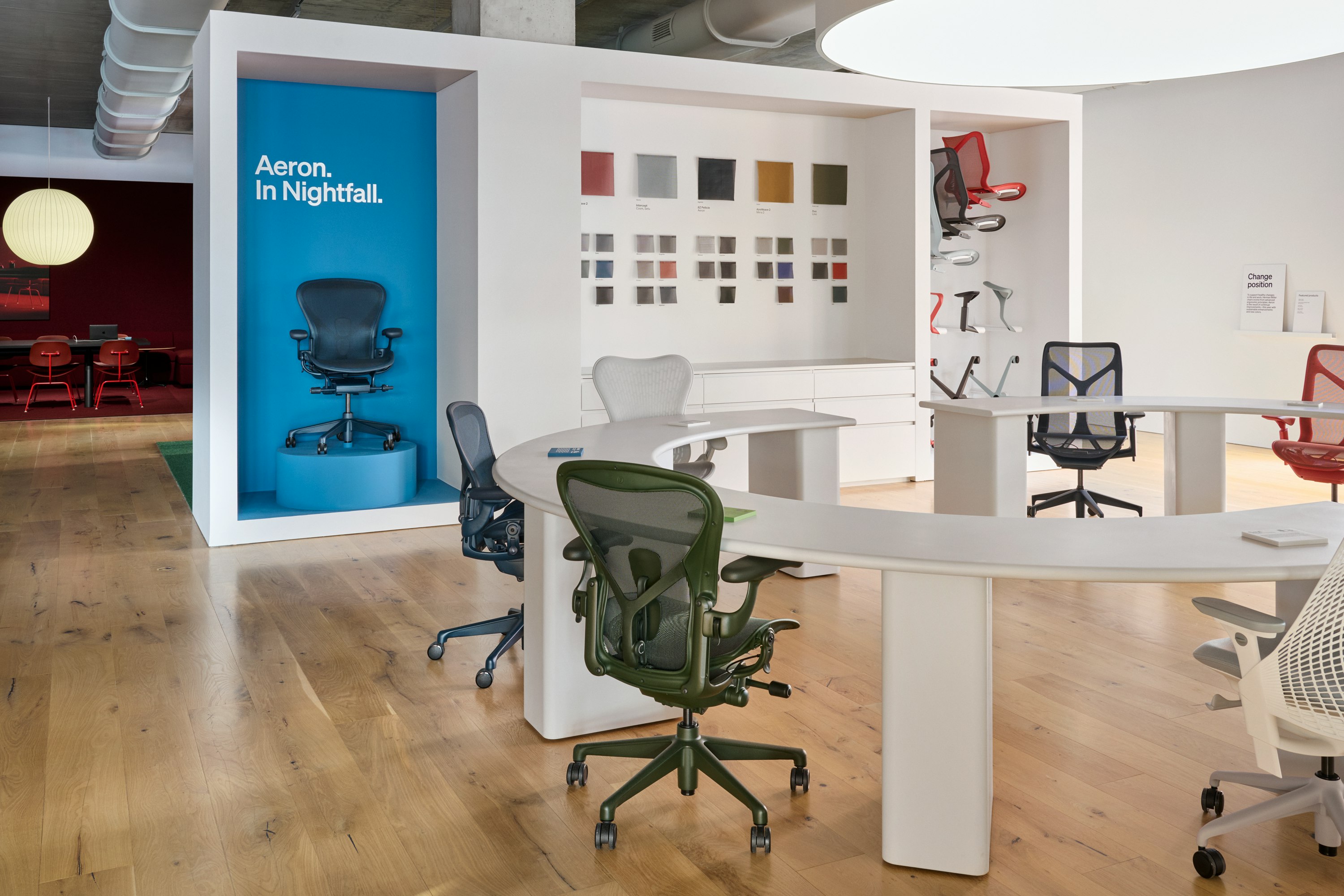 A colorful selection of Herman Miller office chairs, including the new Jasper and Nightfall Aeron Chairs, at the Herman Miller seating experience at MillerKnoll Design Days. 