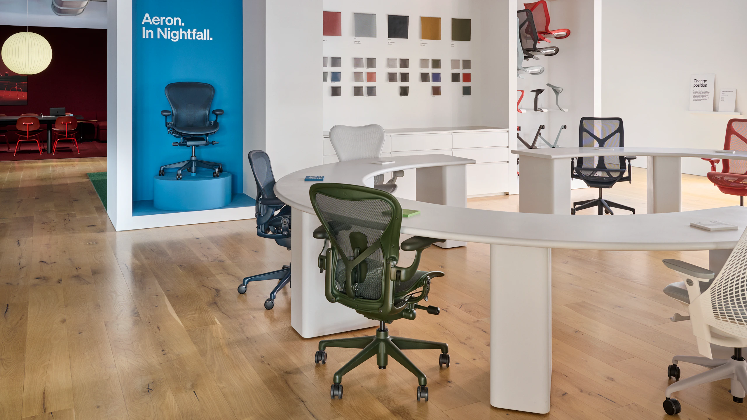 A colorful selection of Herman Miller office chairs, including the new Jasper and Nightfall Aeron Chairs, at the Herman Miller seating experience at MillerKnoll Design Days.