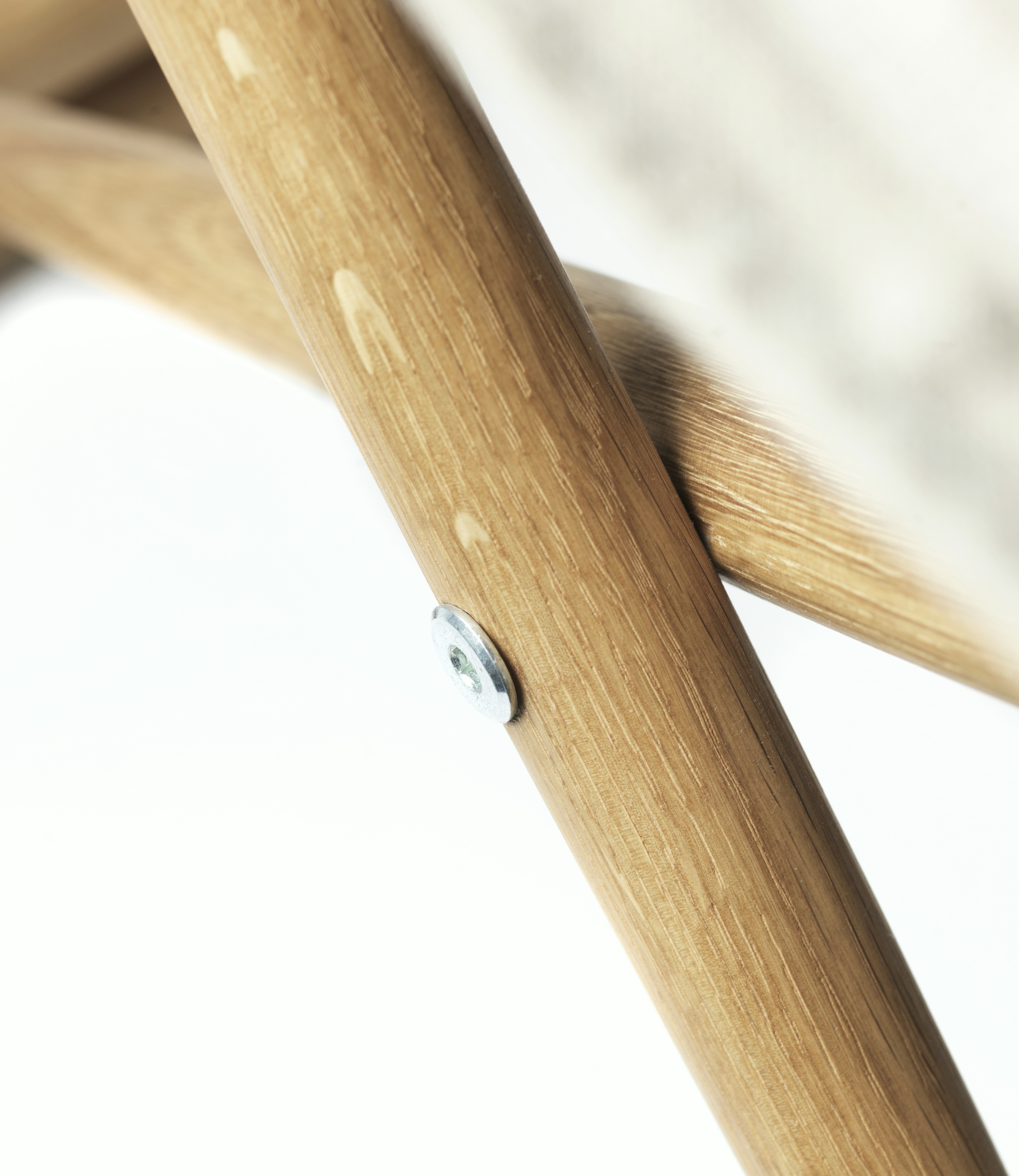 A detailed look at a J138 Folding Chair in Oiled Oak.