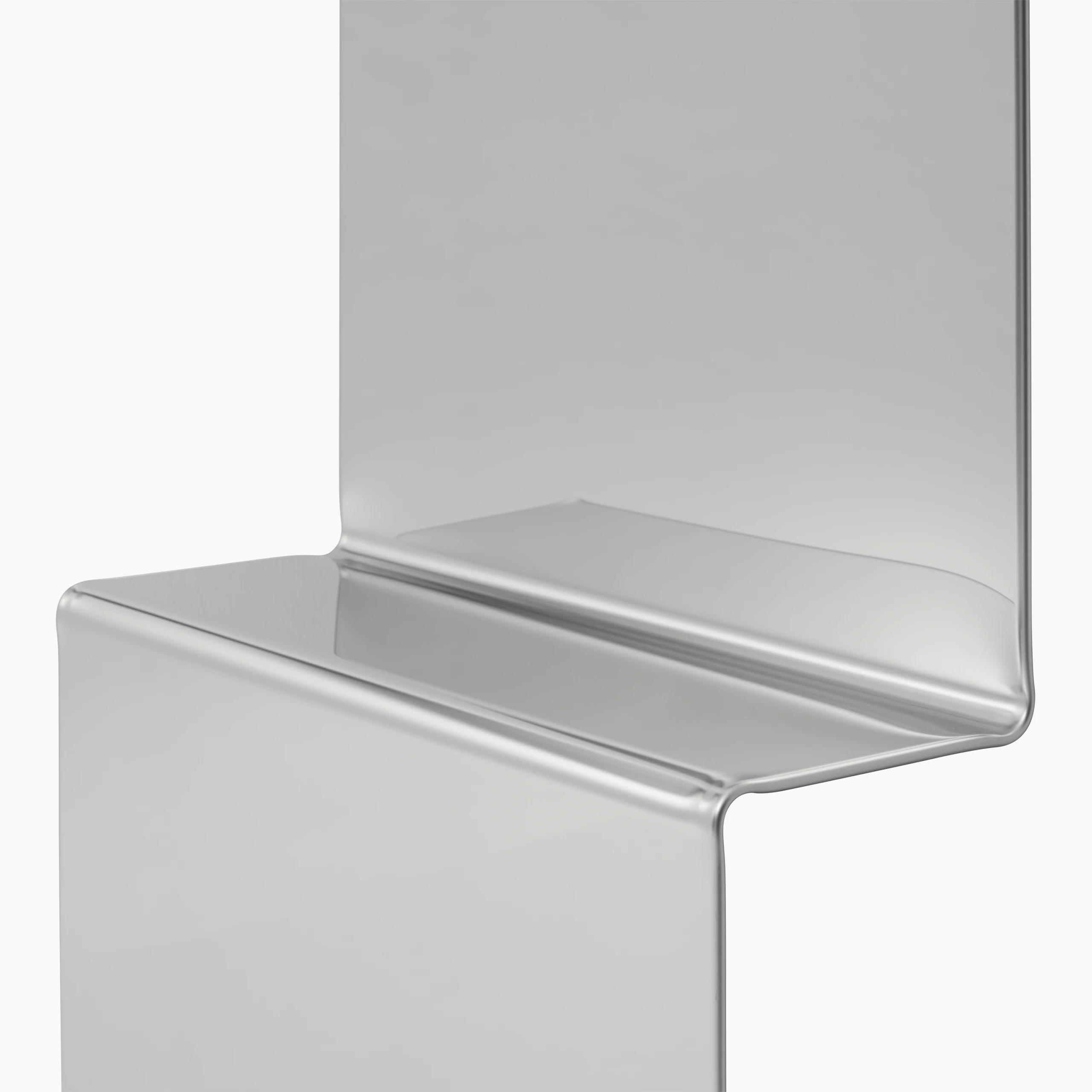 Detailed Shot of Pleat Mirror in Polished Steel