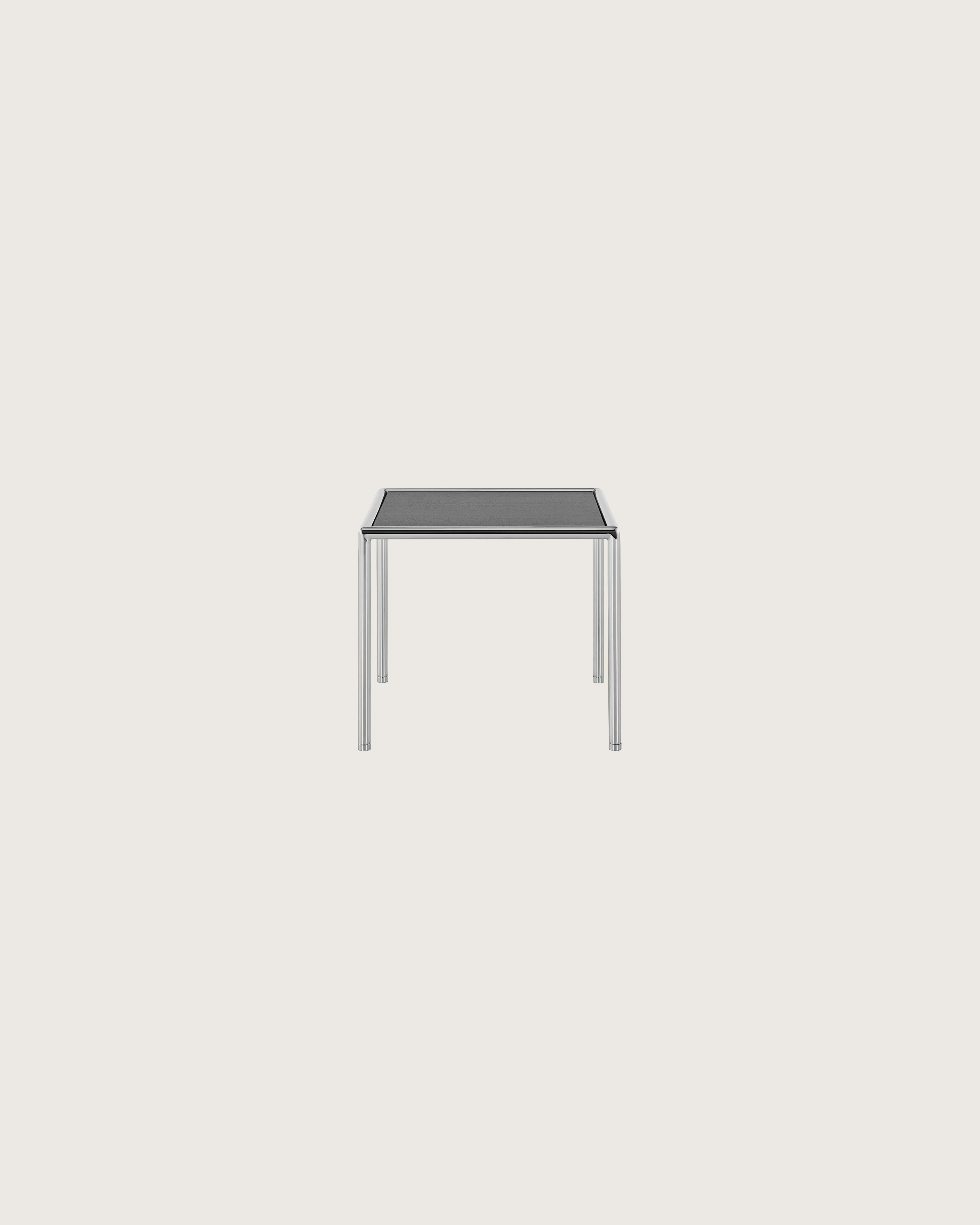 A square Full Round side table with a black wood top and tubular metal frame.