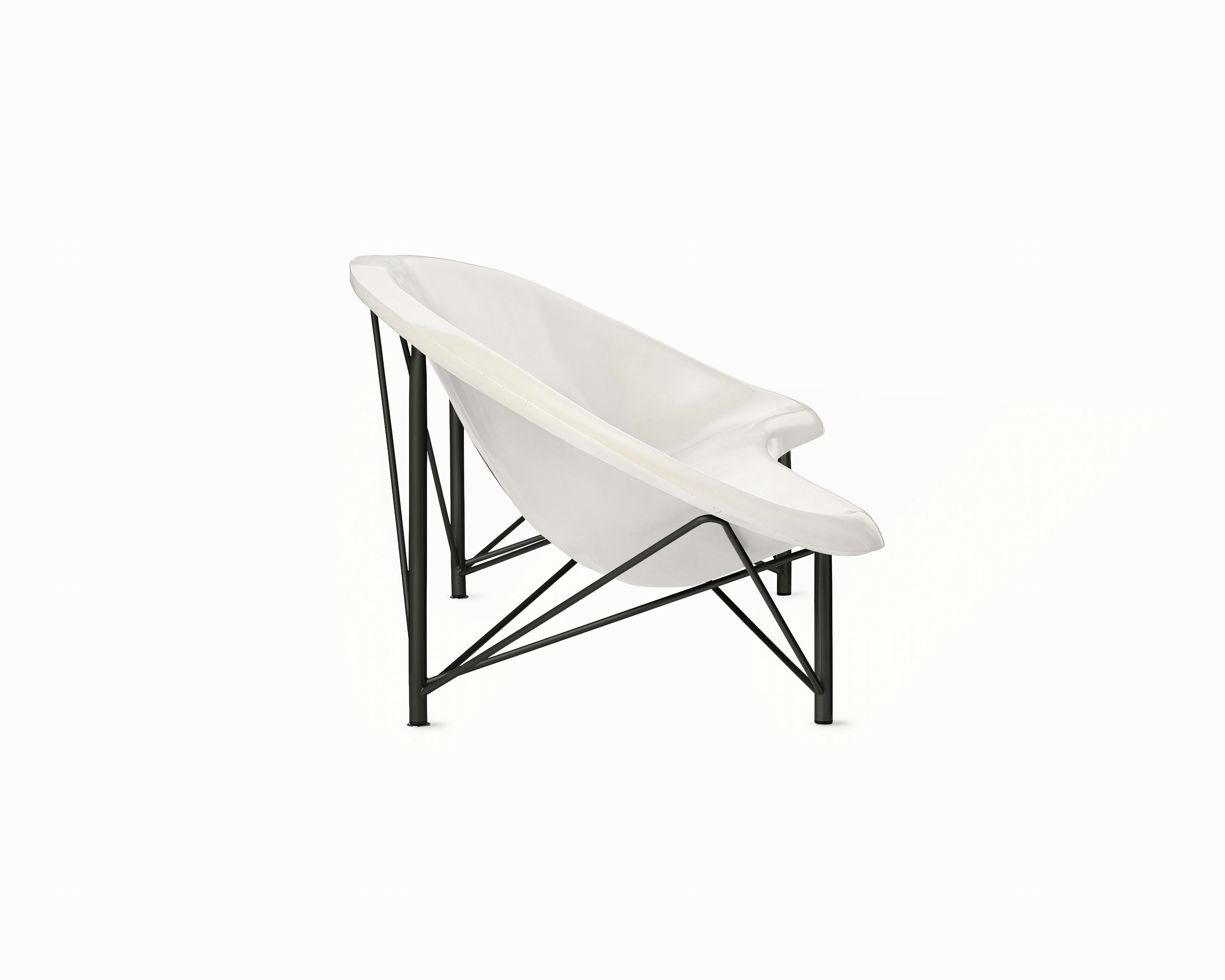 Helios Heated Lounge Sofa in Bone and Black viewed from the side