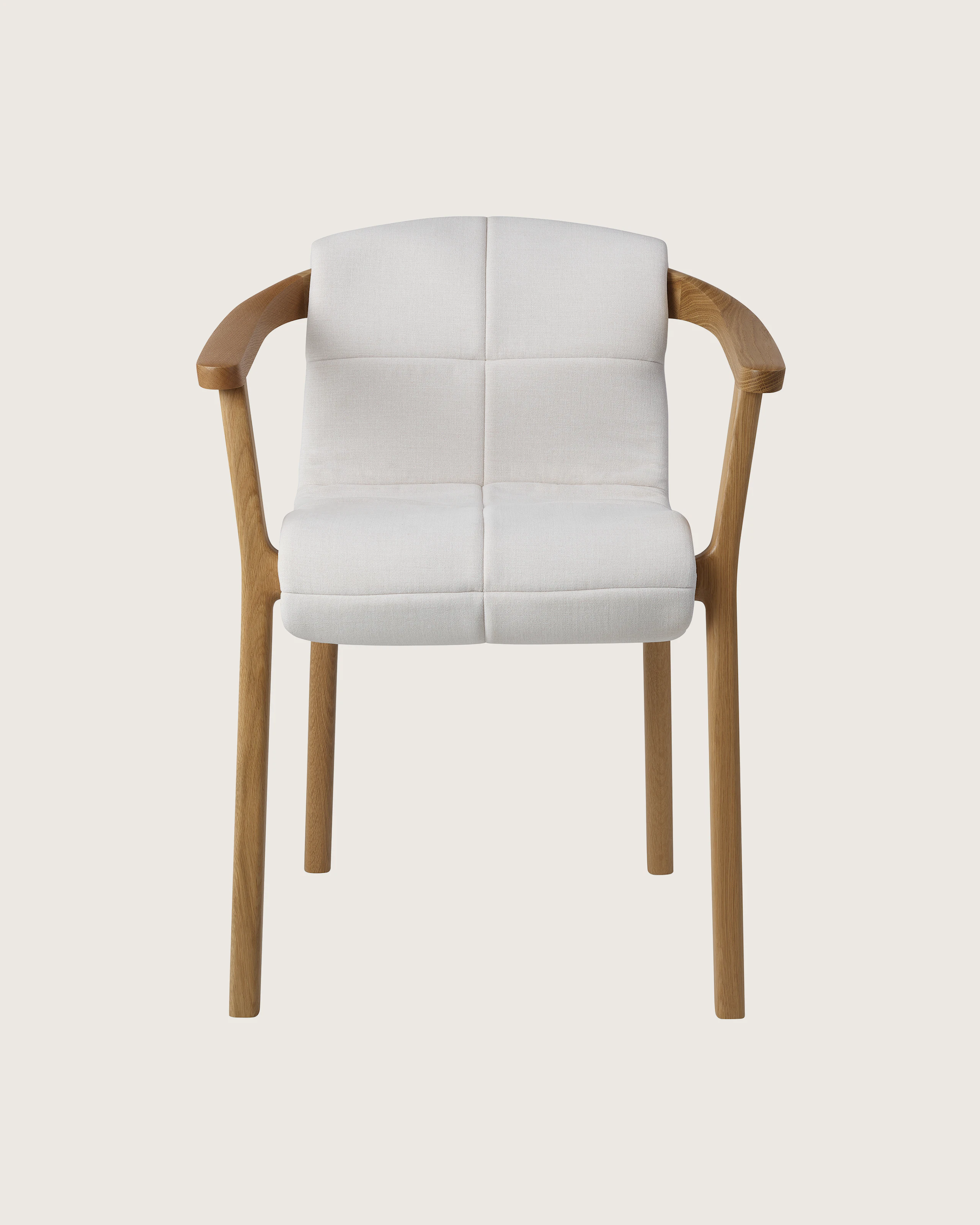 Lijn Armchair by Carole Baijings for Geiger in Natural Oak frame with quilted wrap in Vionette White Sand Mix, front view on a white sweep.