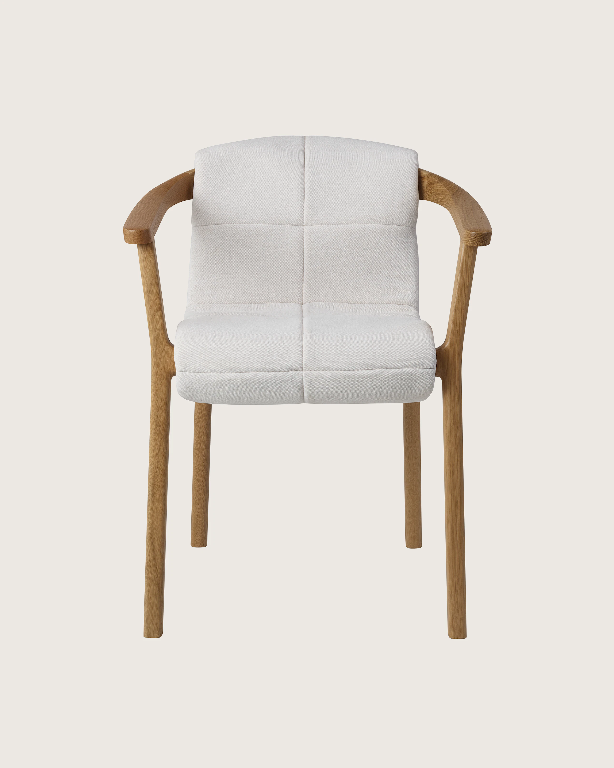 Lijn Armchair by Carole Baijings for Geiger in Natural Oak frame with quilted wrap in Vionette White Sand Mix, front view on a white sweep.