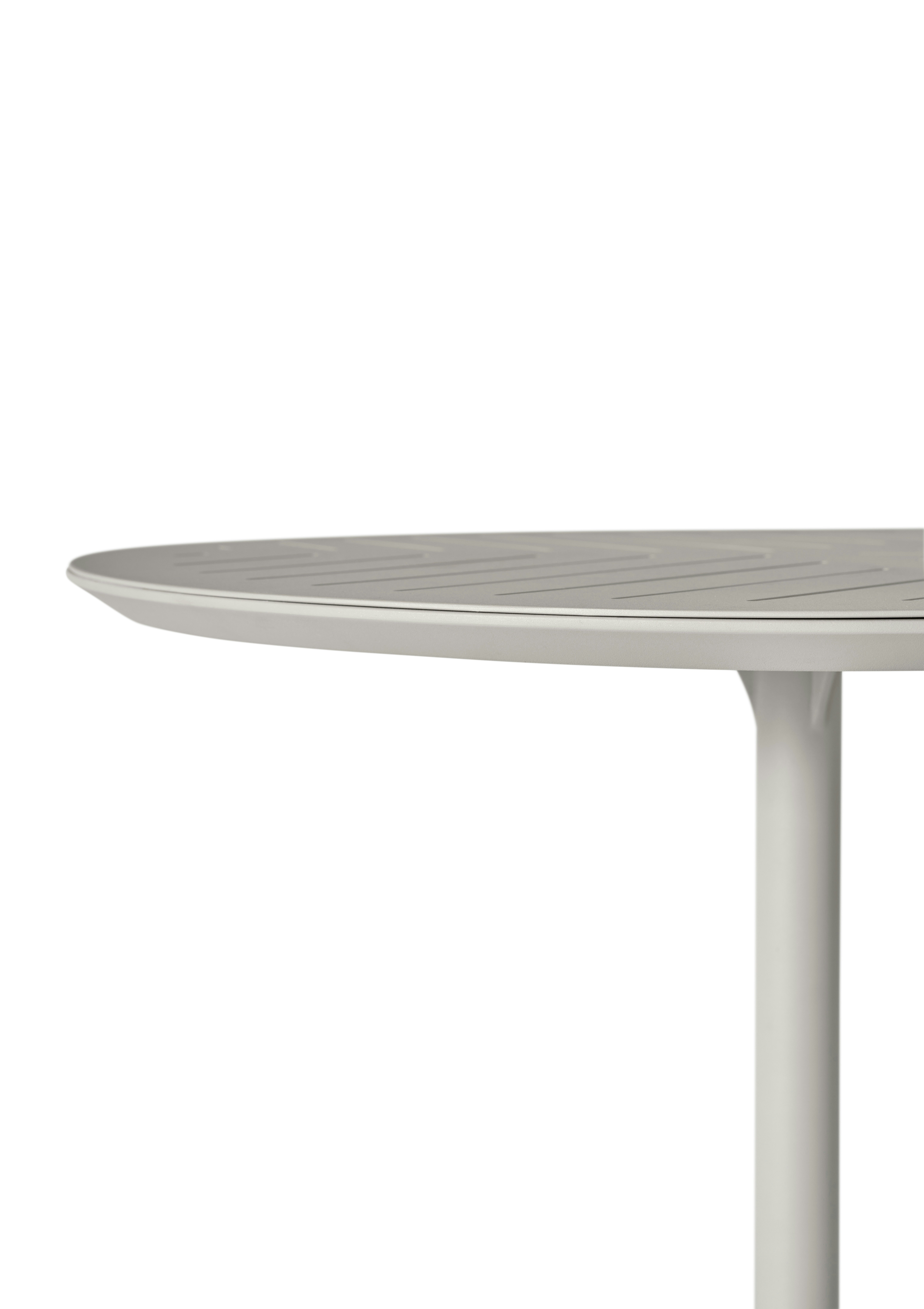 A detailed look at the Vipp717 Open-Air Cafe Table.