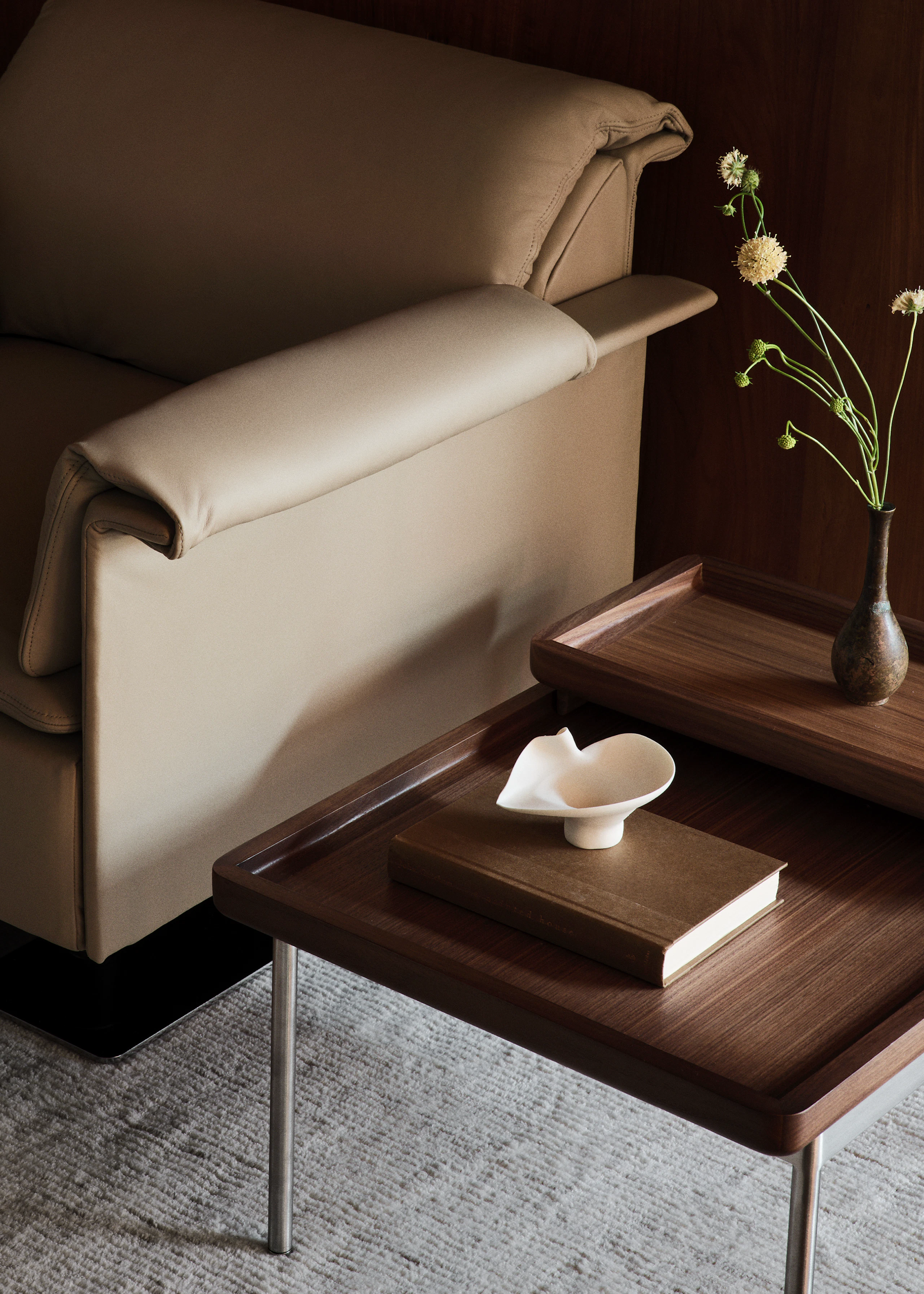 Tuxedo Component Side Table designed by BassamFellows for Geiger in natural walnut shown next to a Mantle Club Chair.