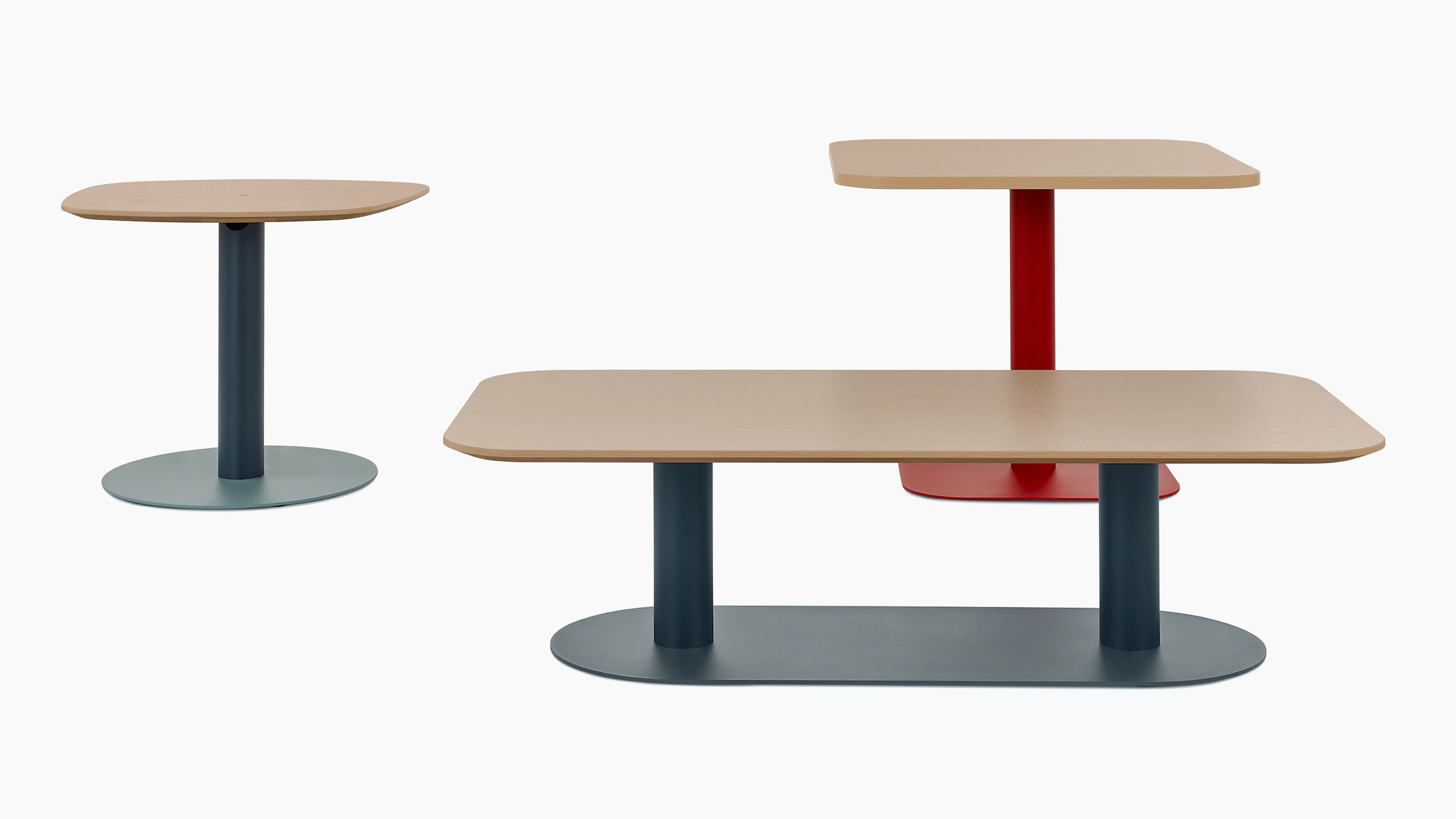 Group of Headway Cafe tables in multiple colors including soft rectangle occasional height, soft square seated height, and apple low conference height.