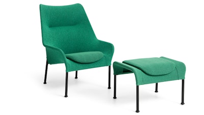 A front three quarter view of a green O2 Lounge and Ottoman from HAY