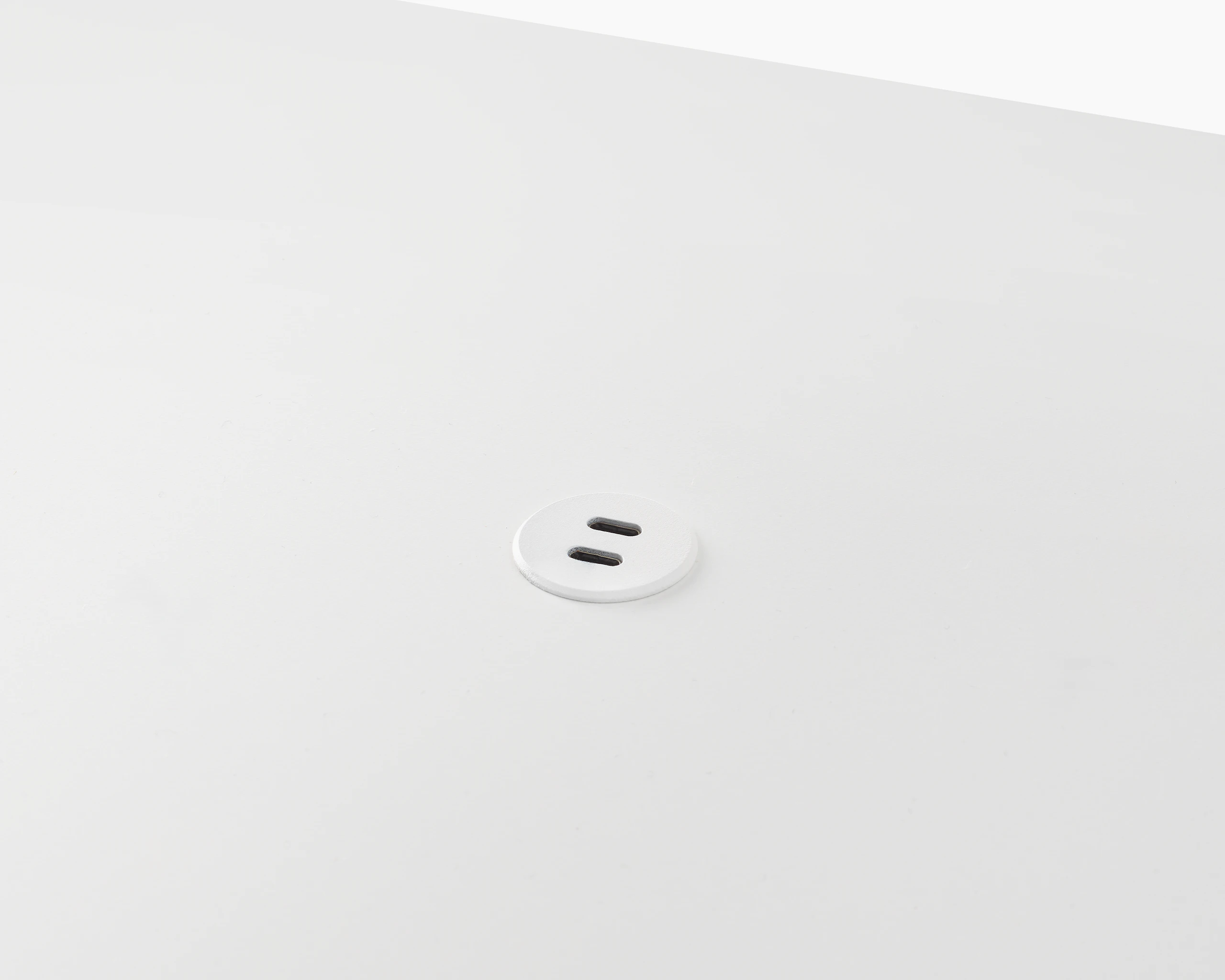 Surface-integrated dual port USB-C power solution shown in white.