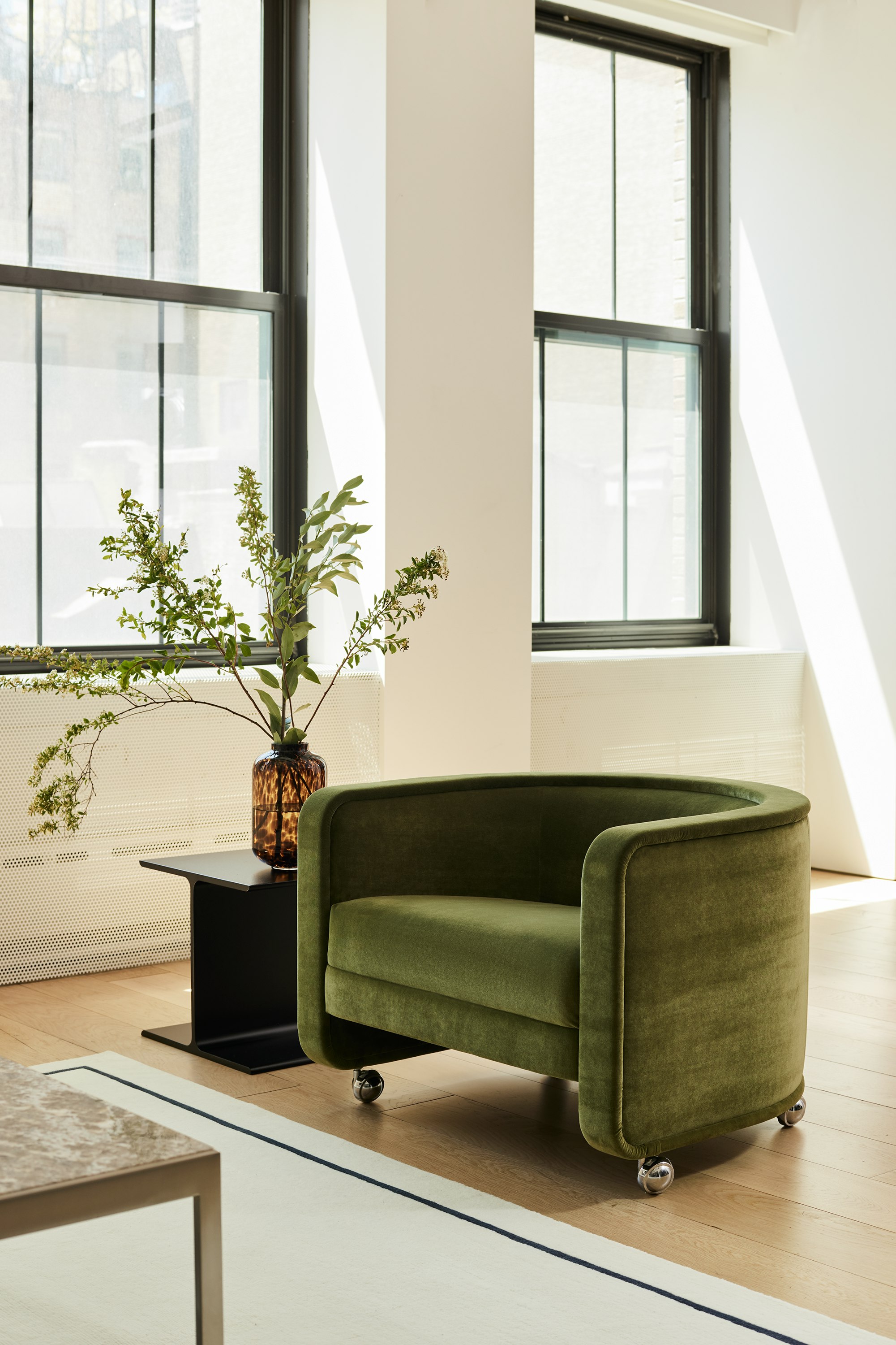 U Series Lounge Chair on casters in a contract lobby setting.