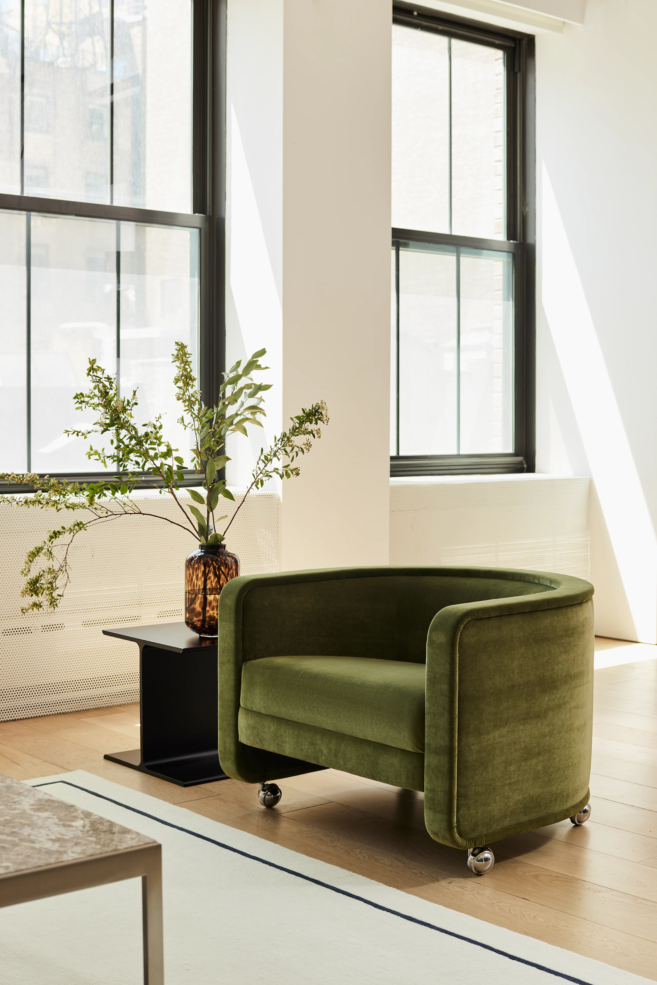 U Series Lounge Chair on casters in a contract lobby setting.