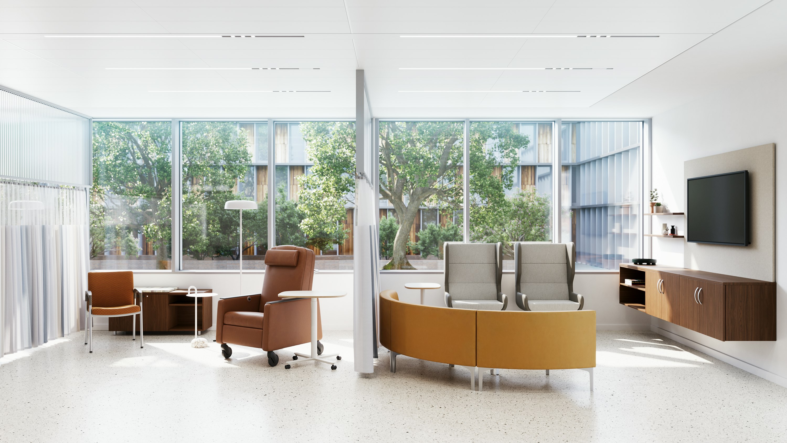 Outpatient waiting area, furnished with a red Herman Miller Gemma Recliner, Nemschoff Valor Side Chair, and other furniture from the MillerKnoll portfolio, overlooking an outdoor space filled with green foliage.