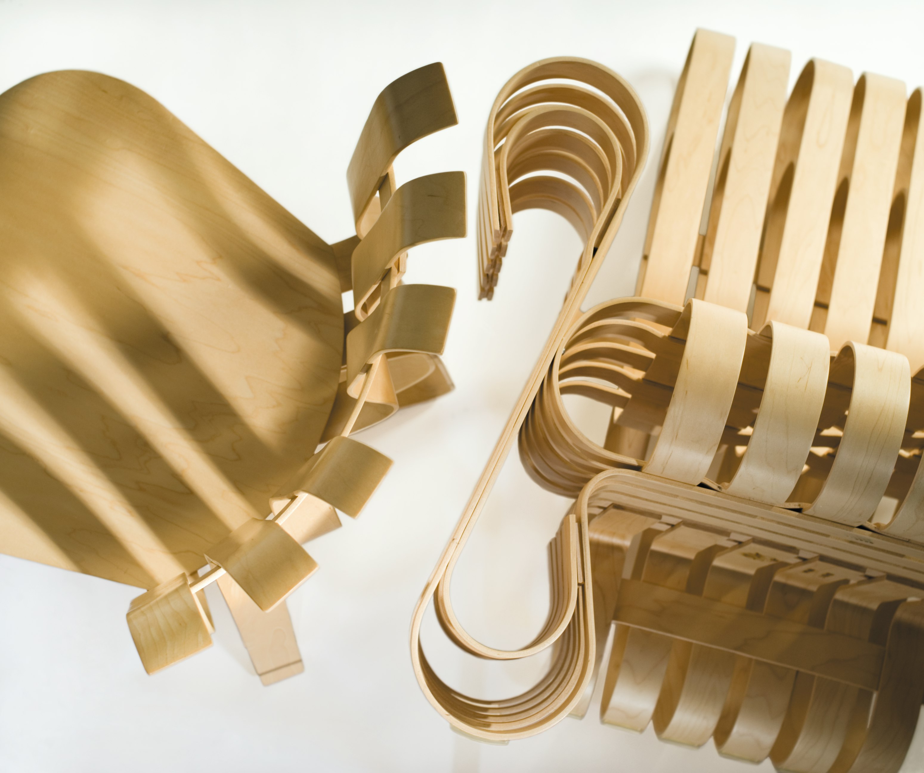 Frank Gehry Hat Trick and Power Play maple chairs