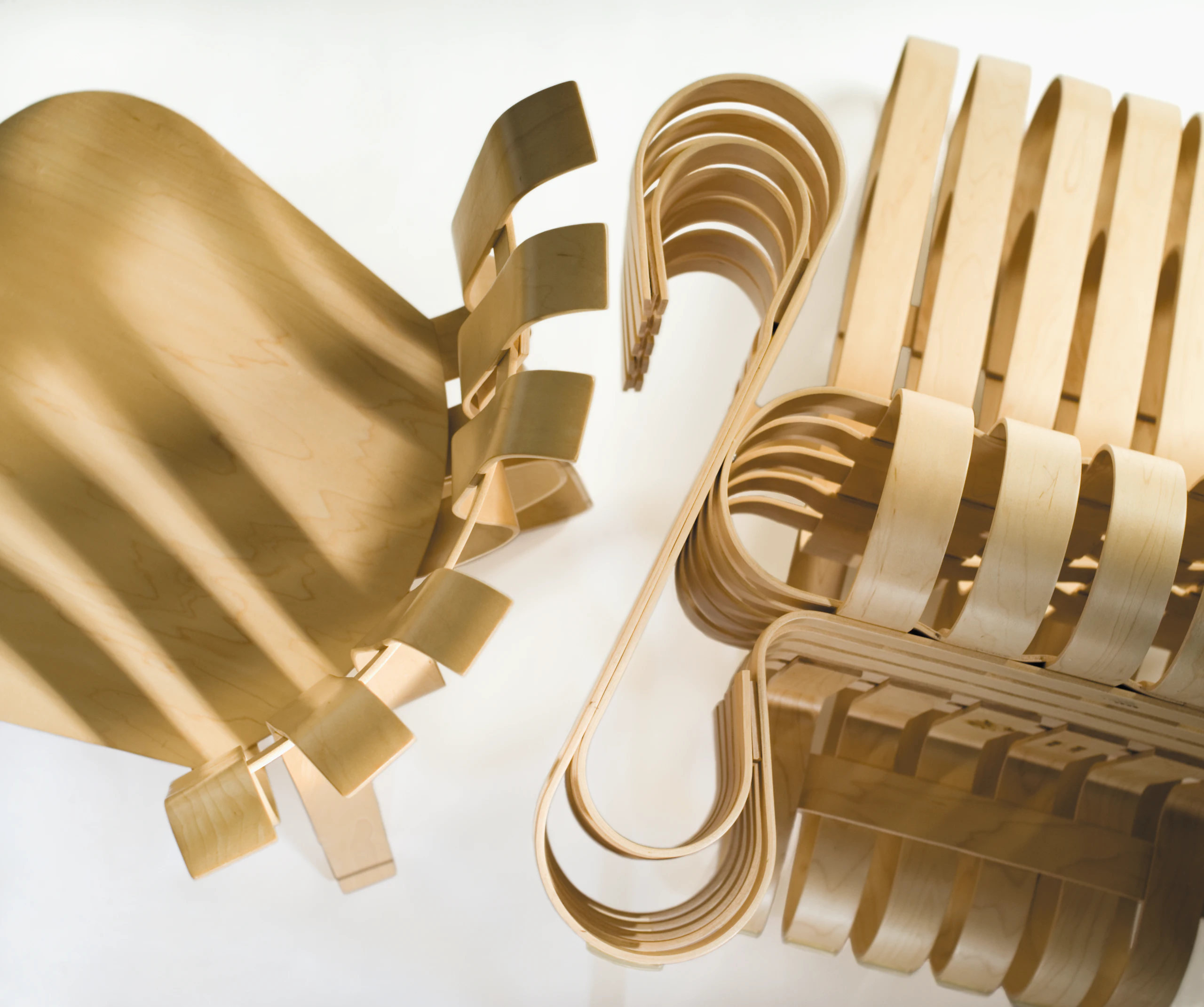 Frank Gehry Hat Trick and Power Play maple chairs