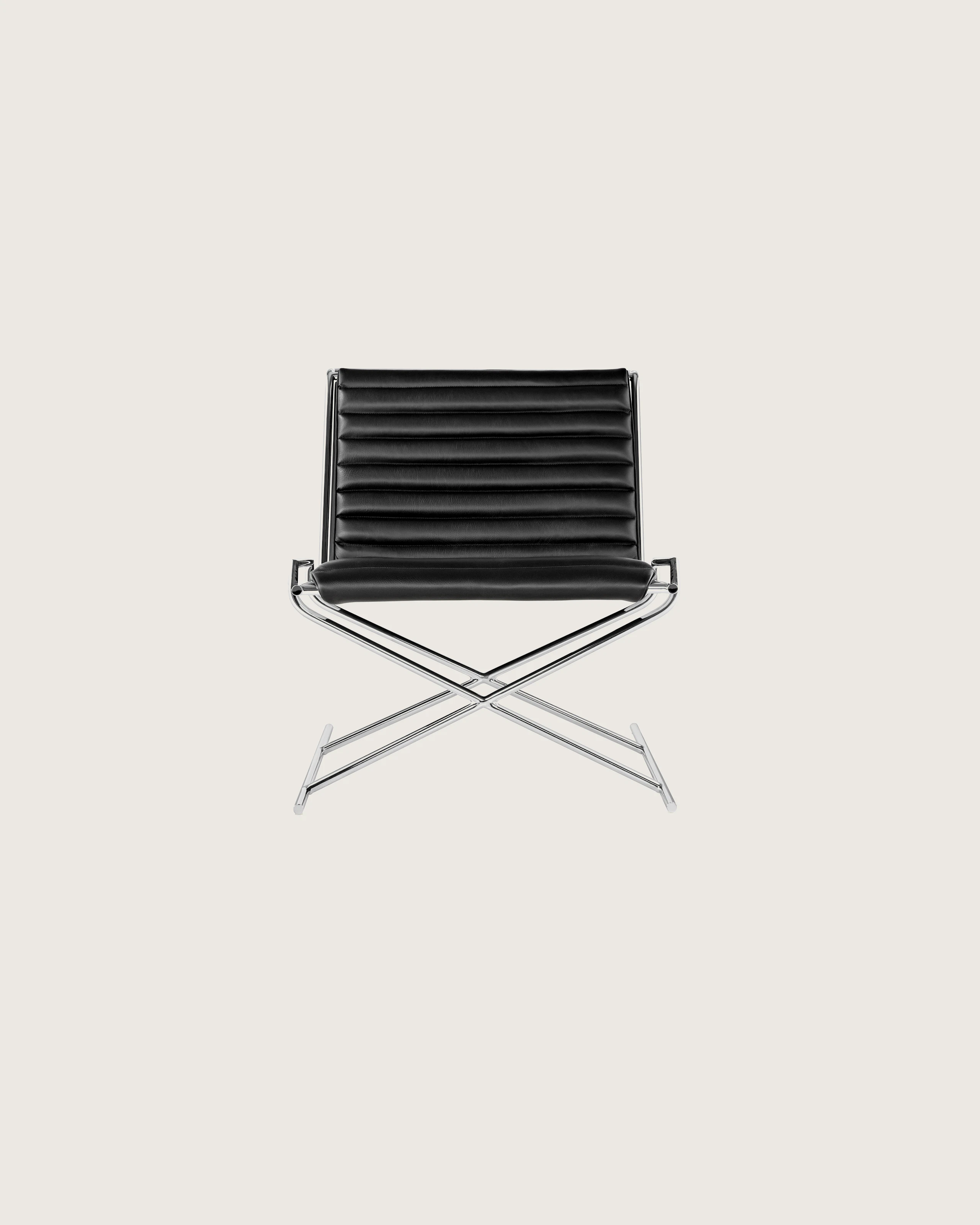 A Sled Chair with black leather upholstery and an X-shaped steel base, viewed from the front.