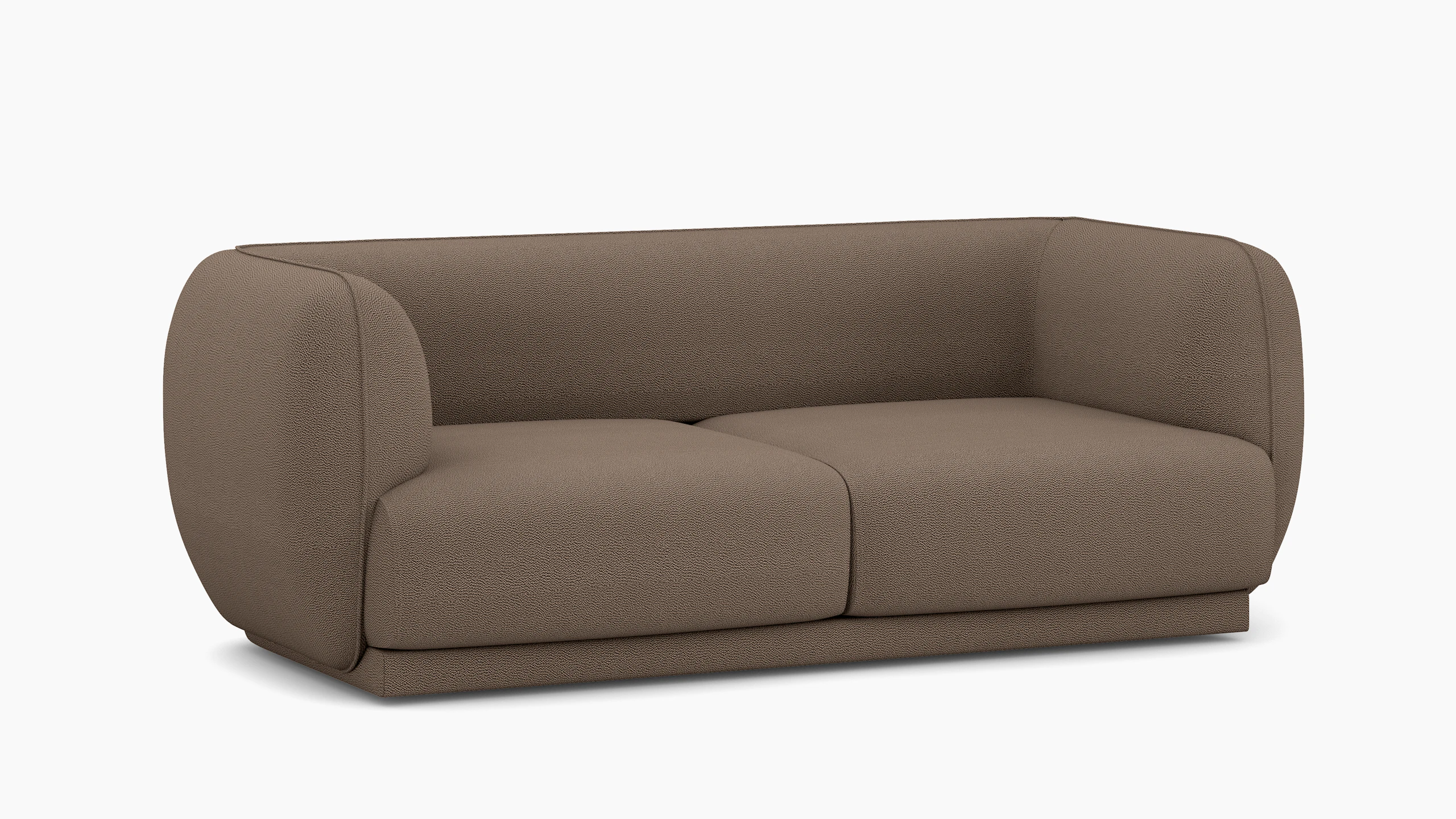 A Meris Sofa in Brown viewed from an angle.