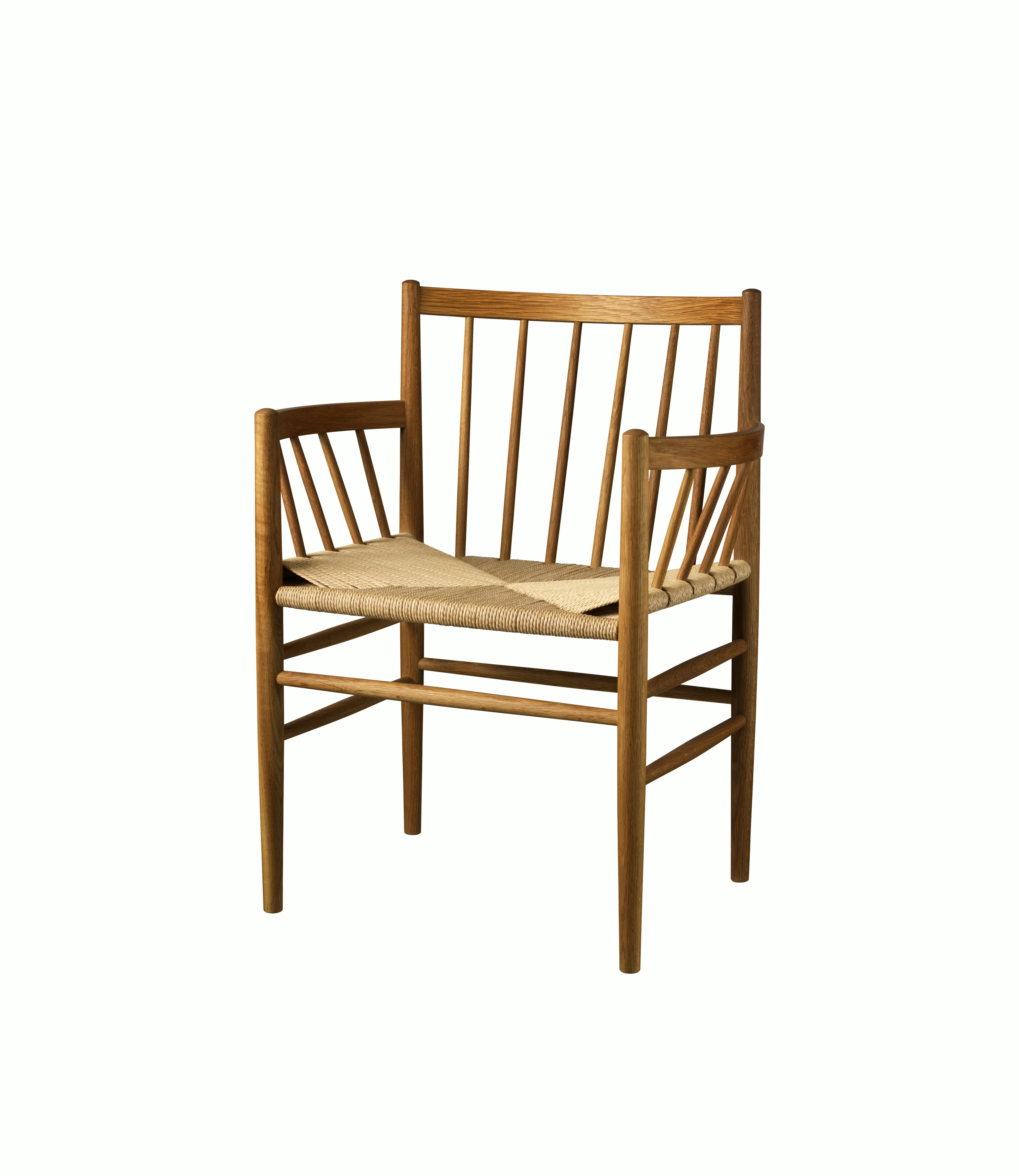 A J81 Armchair in Smoked Oak viewed from an angle.