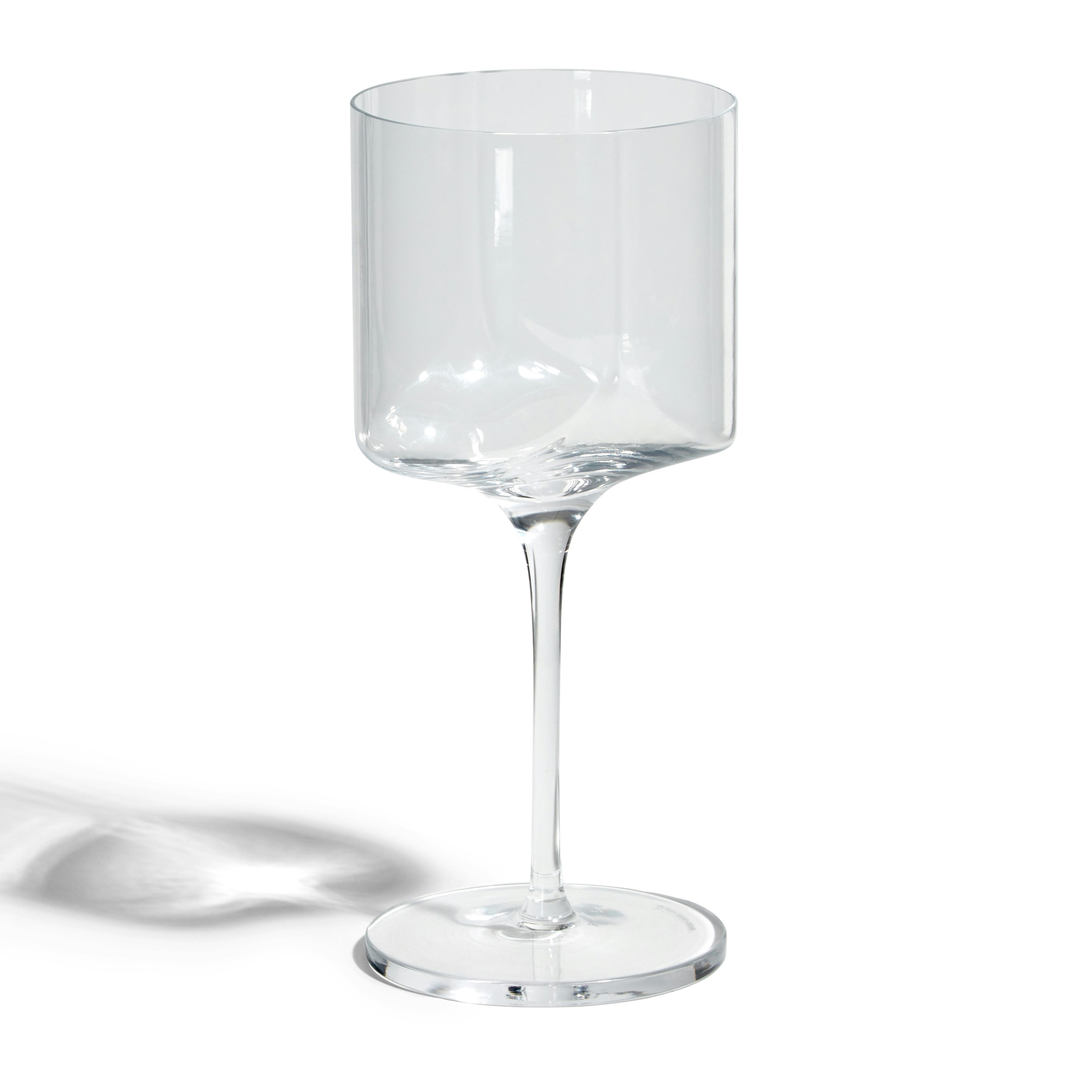 A Hew Wine Glasses in Glass viewed from an angle.