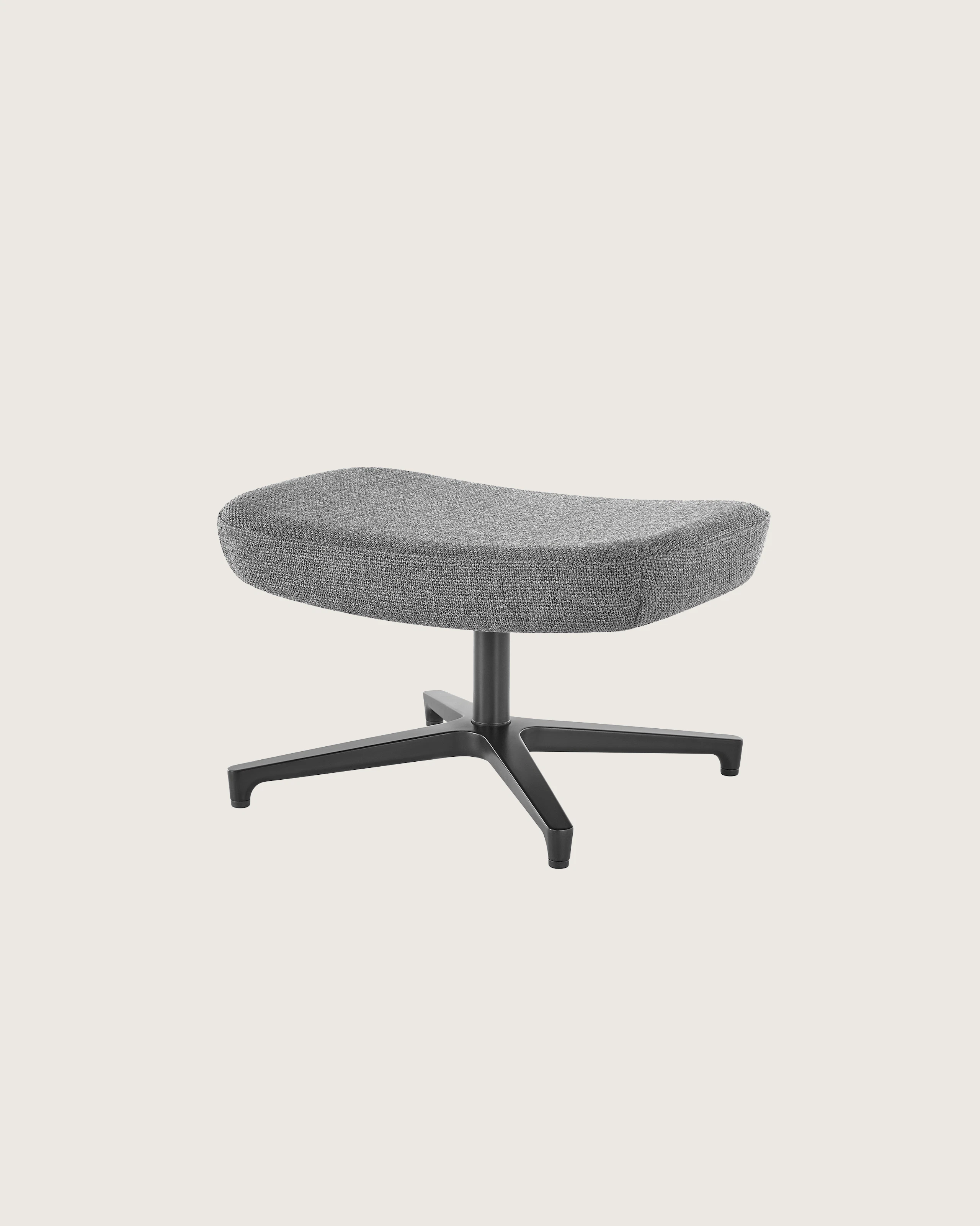A rectangular Saiba ottoman with gray upholstery and a four-star base.