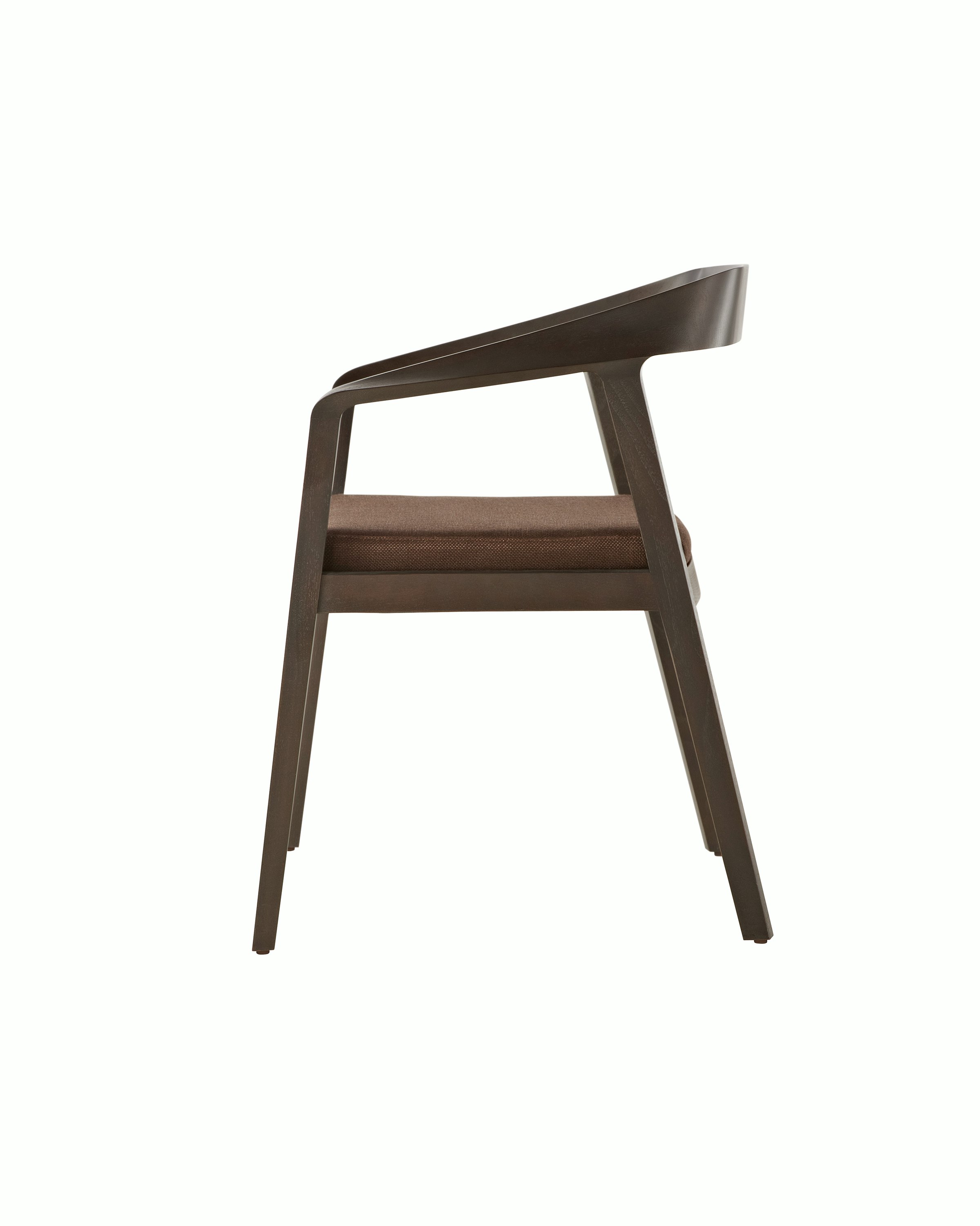 Side view of a Full Twist Guest Chair with a dark wood frame and a brown upholstered seat pad. Select to go to the Side Chairs landing page.