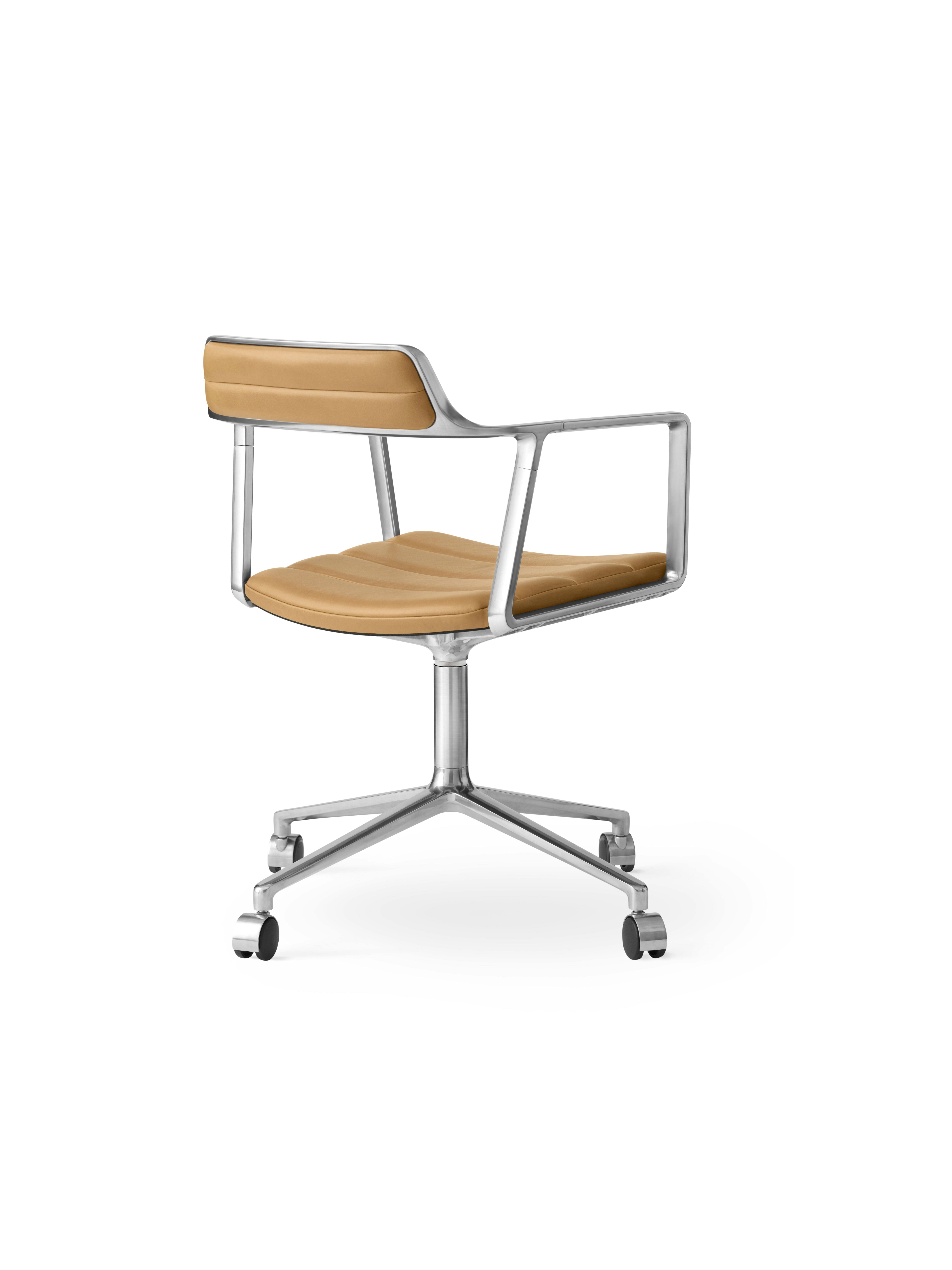 A Vipp452 Swivel Chair Viewed from an angle.
