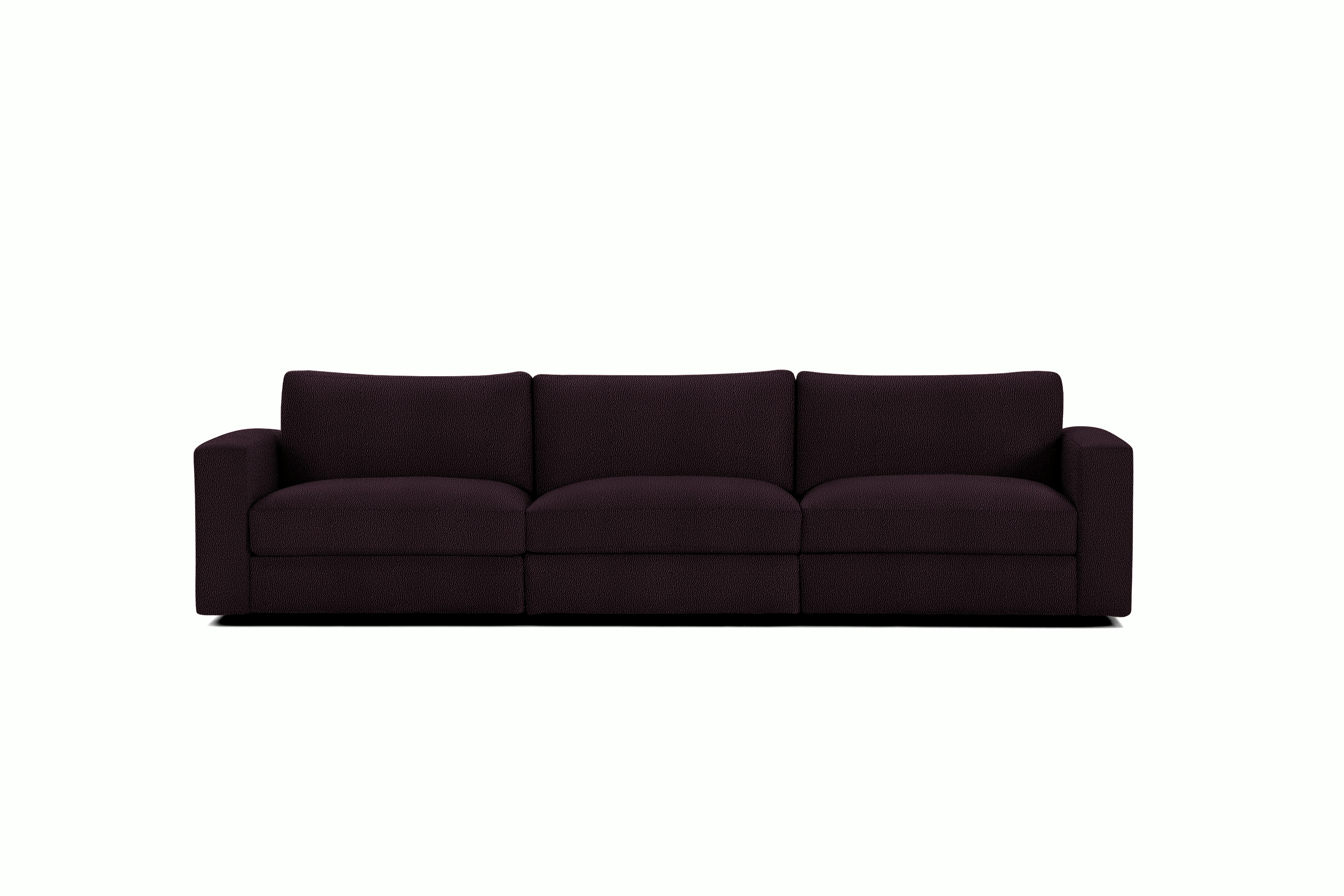 A Reid Sofa in Turf Burgundy viewed from the front.