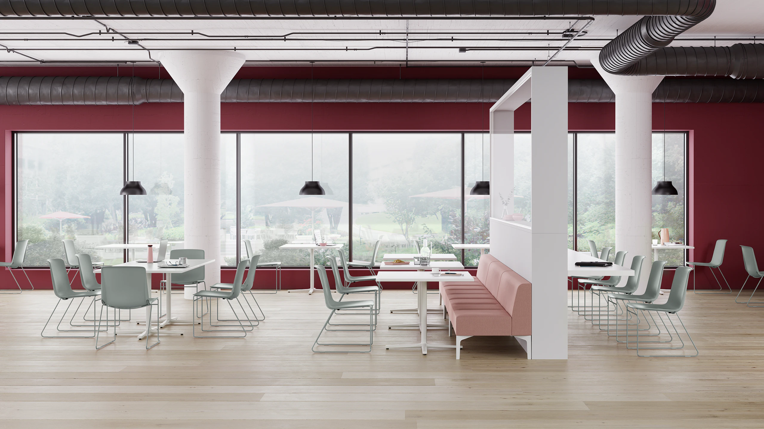 A Café space with glacier blue Pronta Stacking Chairs, white Everywhere Tables, and pink Hatch Modular Seating.