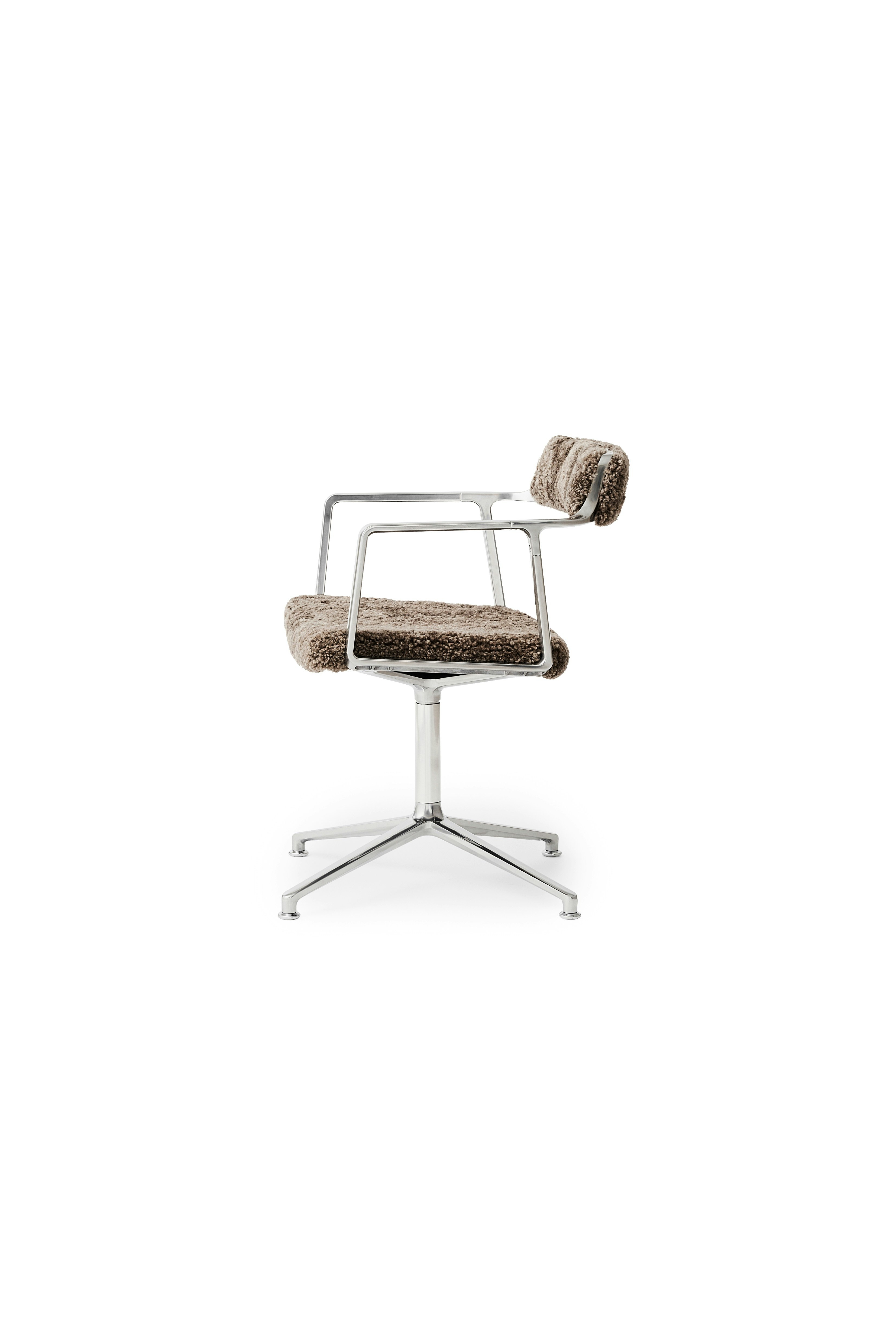 A Vipp452 Swivel Chair Viewed from an angle.