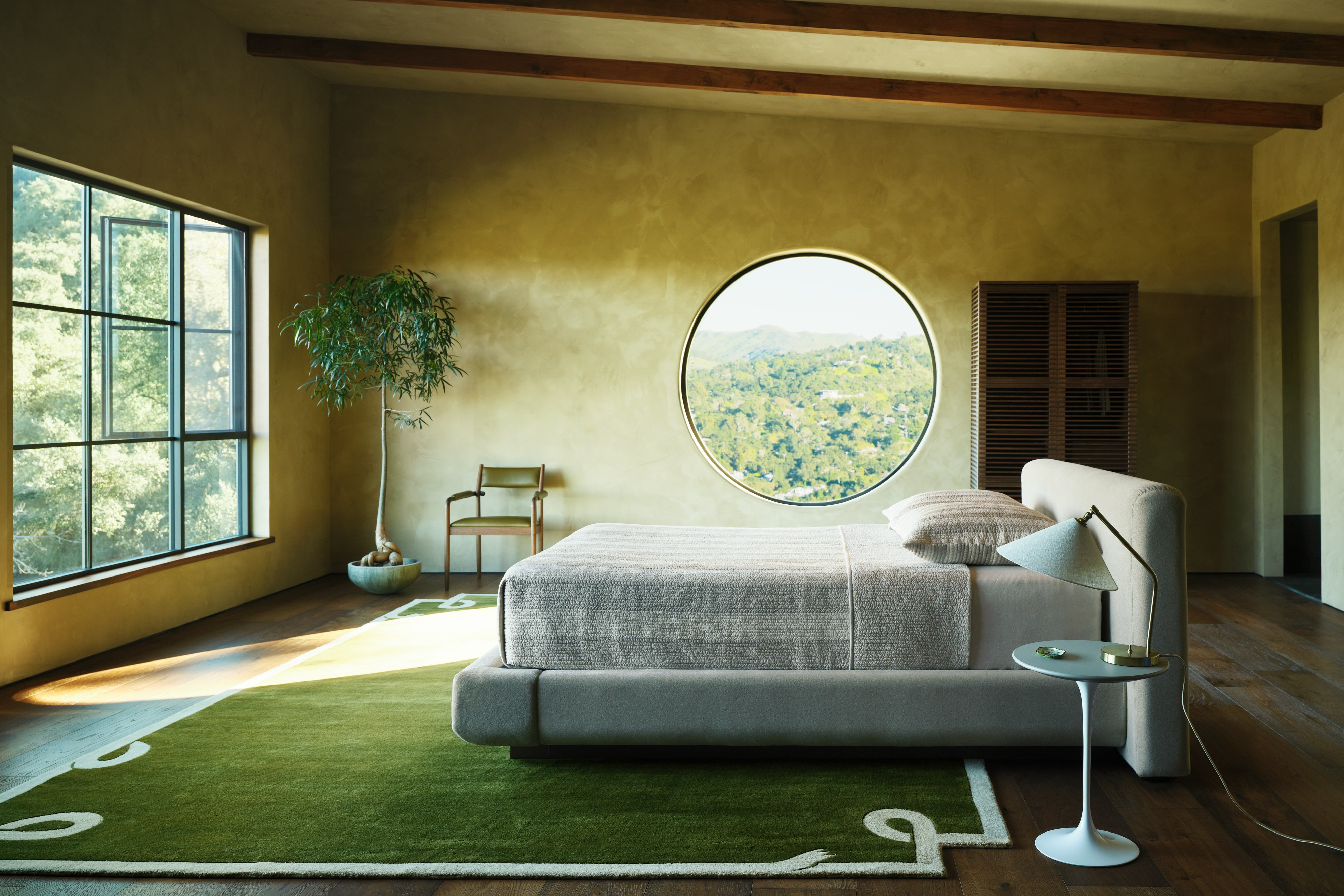 Mesa Bed in Alpaca Mink and Walnut in a bedroom
