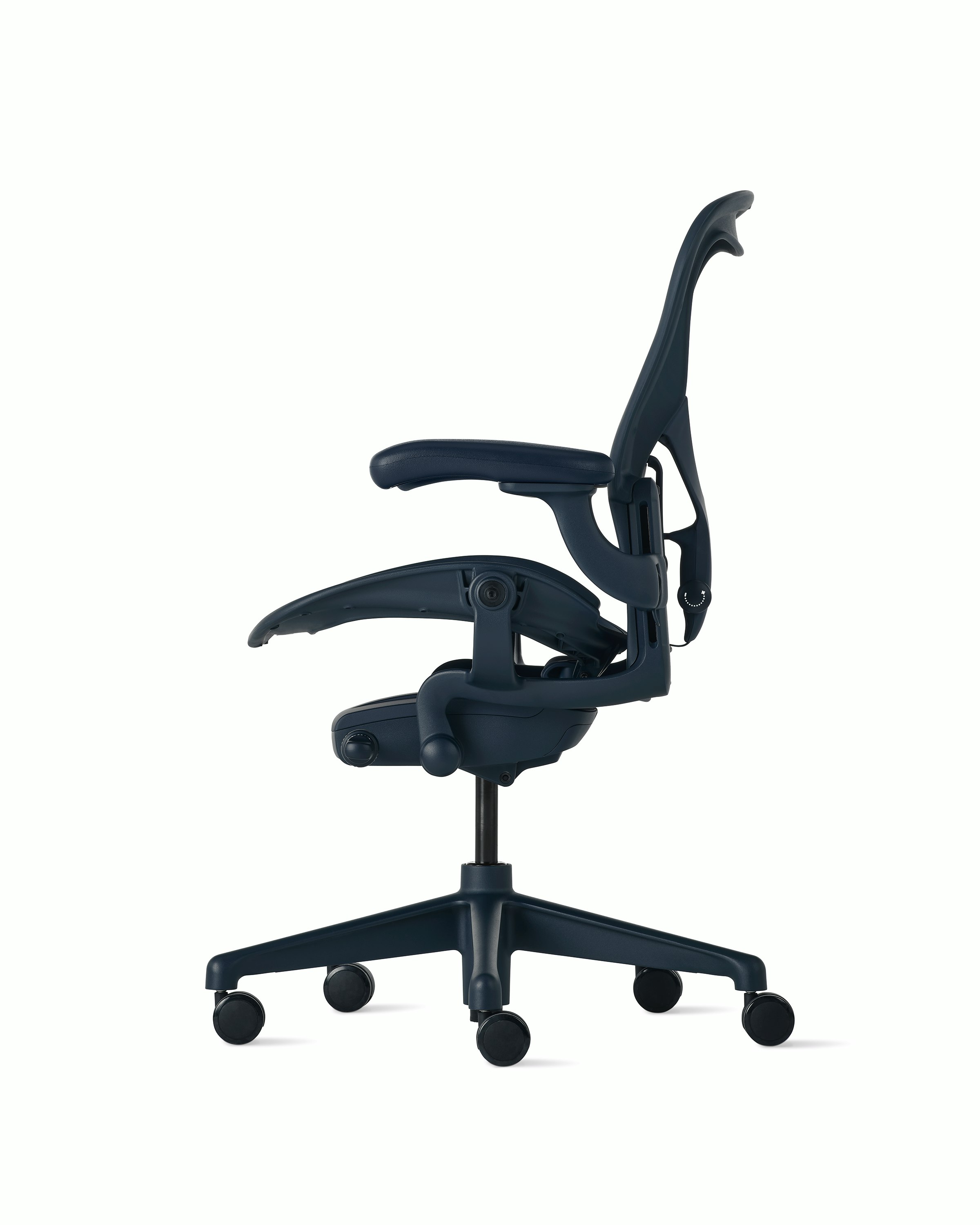 Side view of an Aeron chair in navy with PostureFit SL.