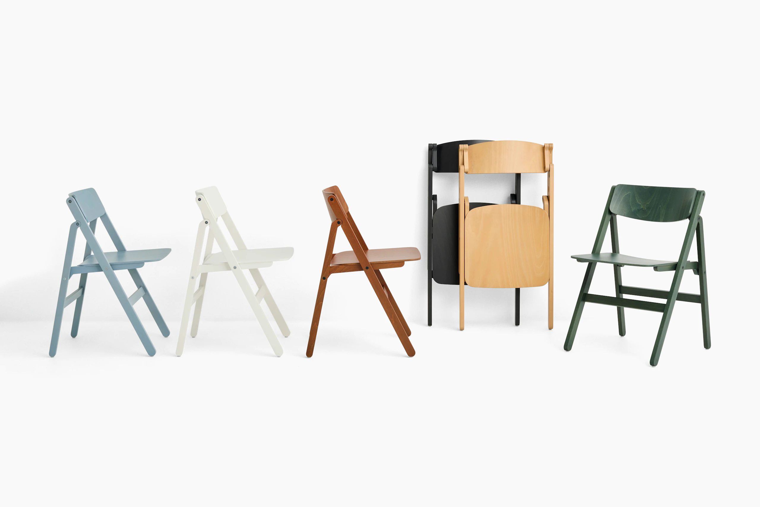 Multiple Backflip folding chairs in array of finishes, multiple angles