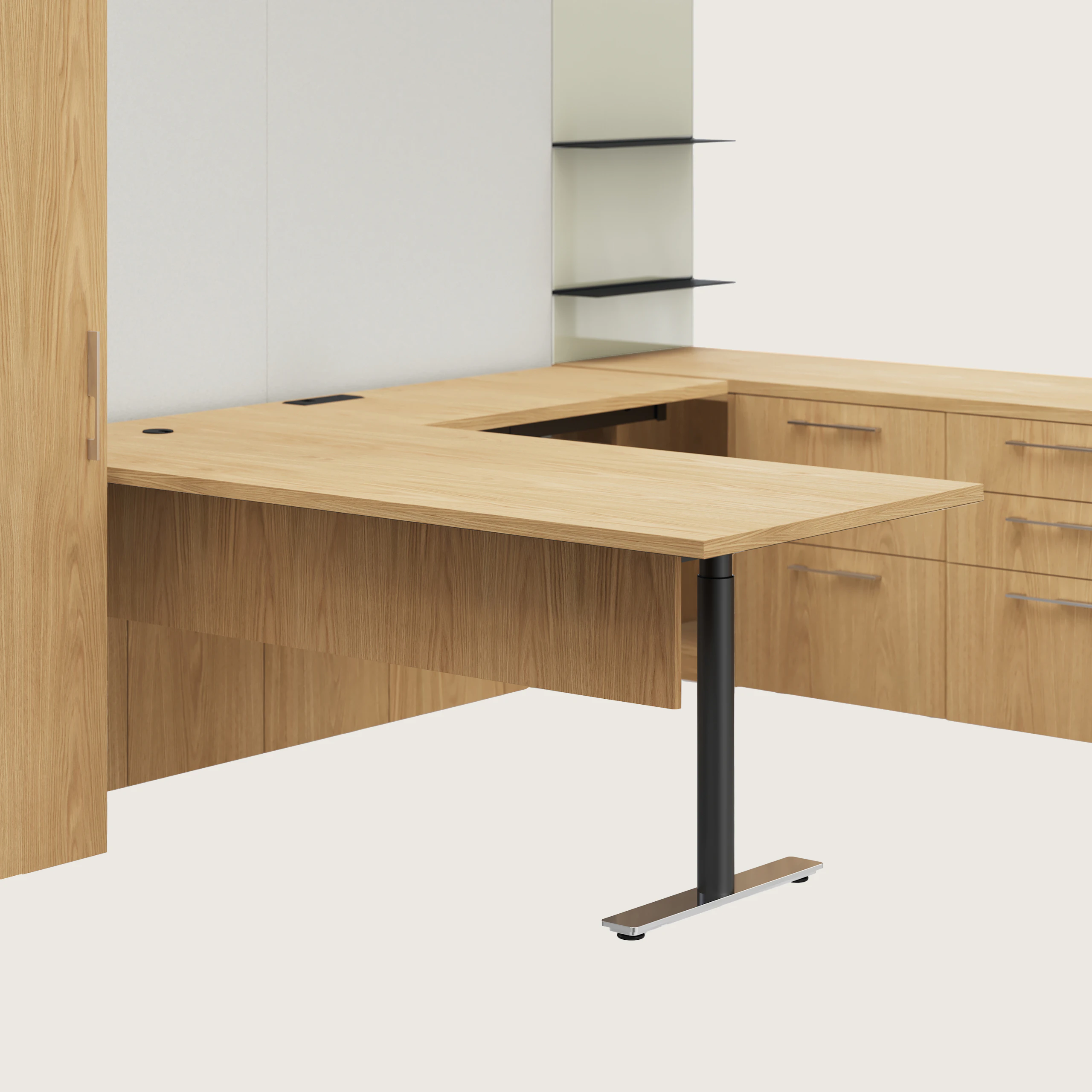 Detail shot of the Geiger One Casegoods t-foot leg option with a black column and chrome foot in a Natural Flat Cut Oak private office.