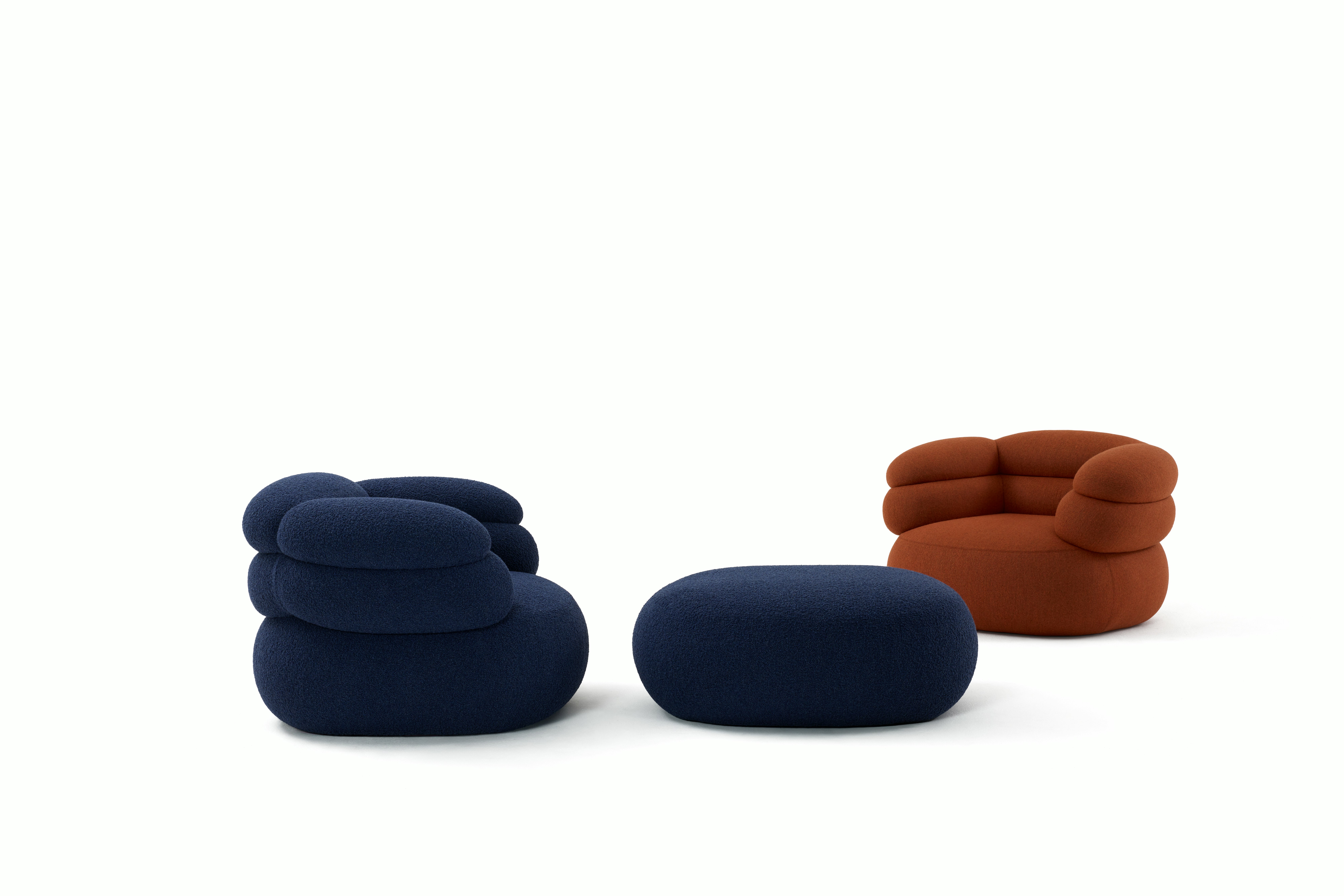 A Biboni Armchair in Solid Sublime, Navy.