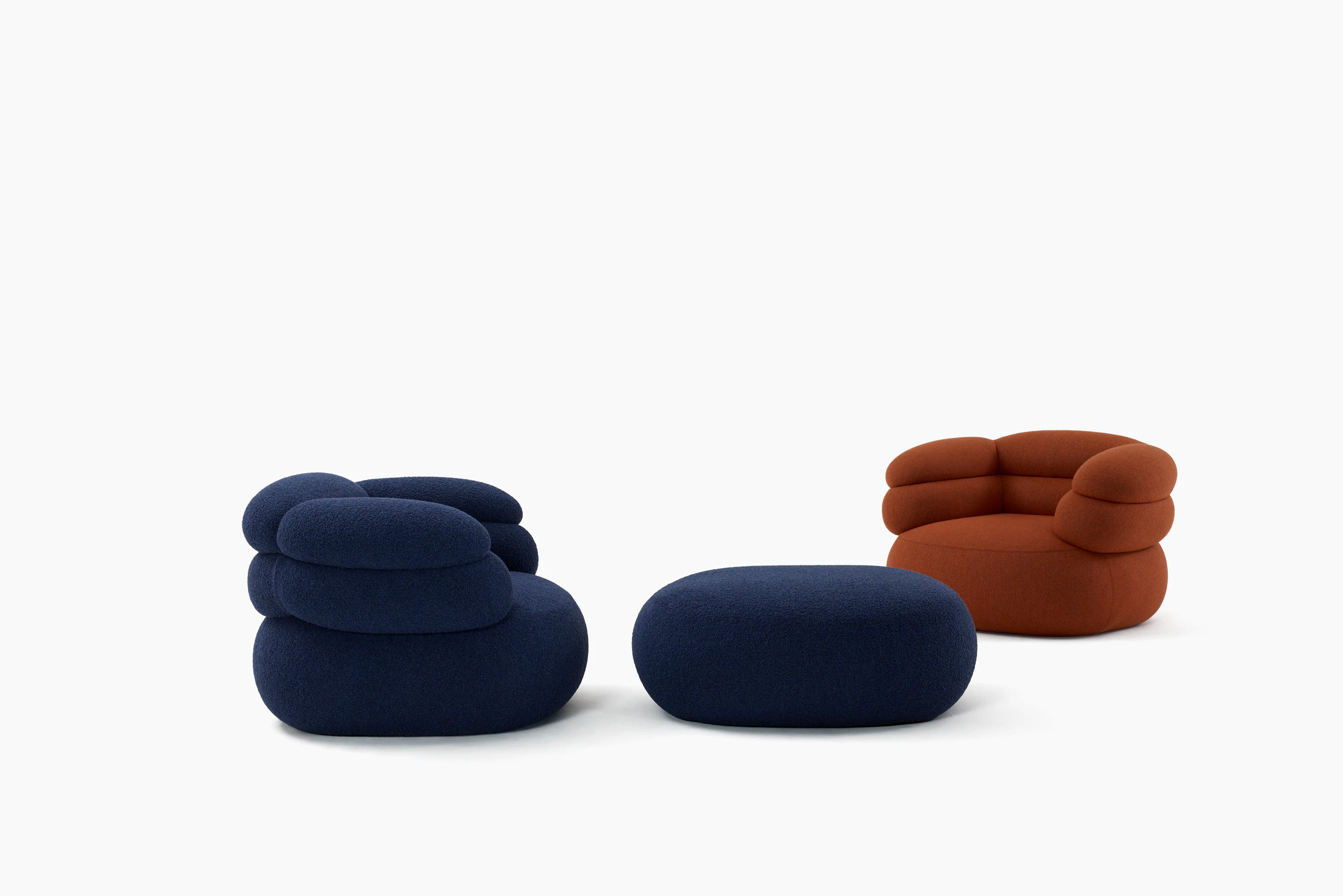 A Biboni Armchair in Solid Sublime, Navy.