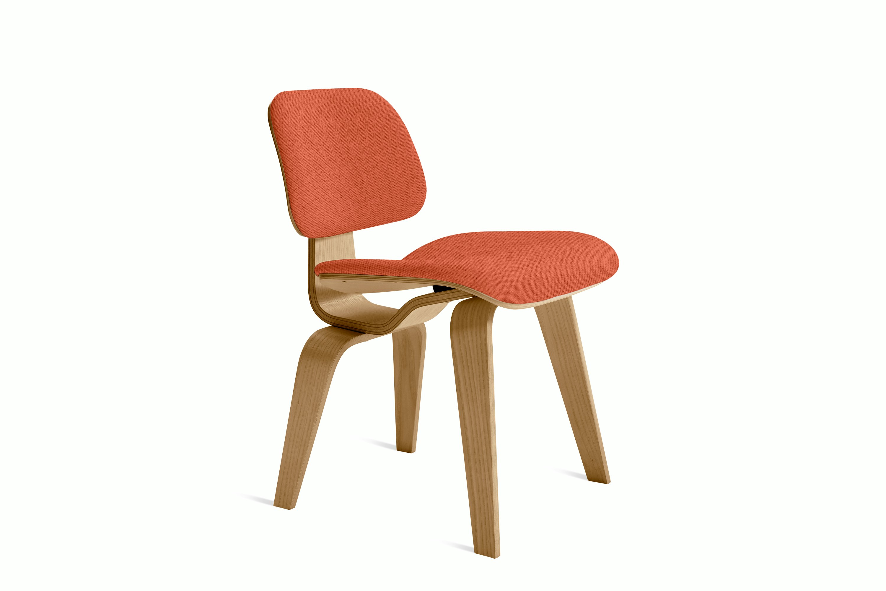 A Eames Molded Plywood Dining Chair Wood Base (DCW) in oak swelter viewed from an angle.